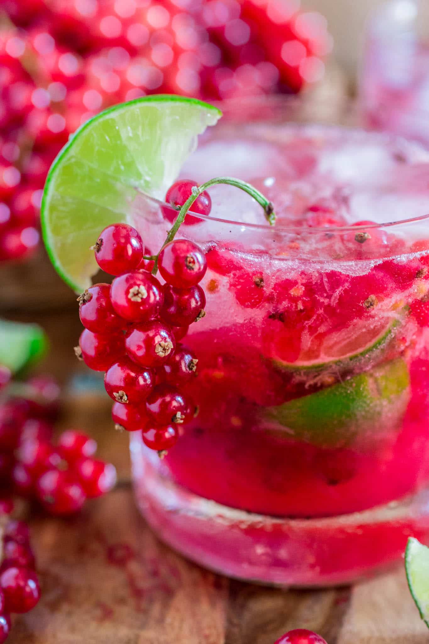 Red Currant Caipirinha | www.oliviascuisine.com | This red currant twist on a classic lime Caipirinha might be my new favorite summertime cocktail! Sour, sweet and as strong as you can take it. There's really no better way to beat the heat! (Sponsored by HBF International.)