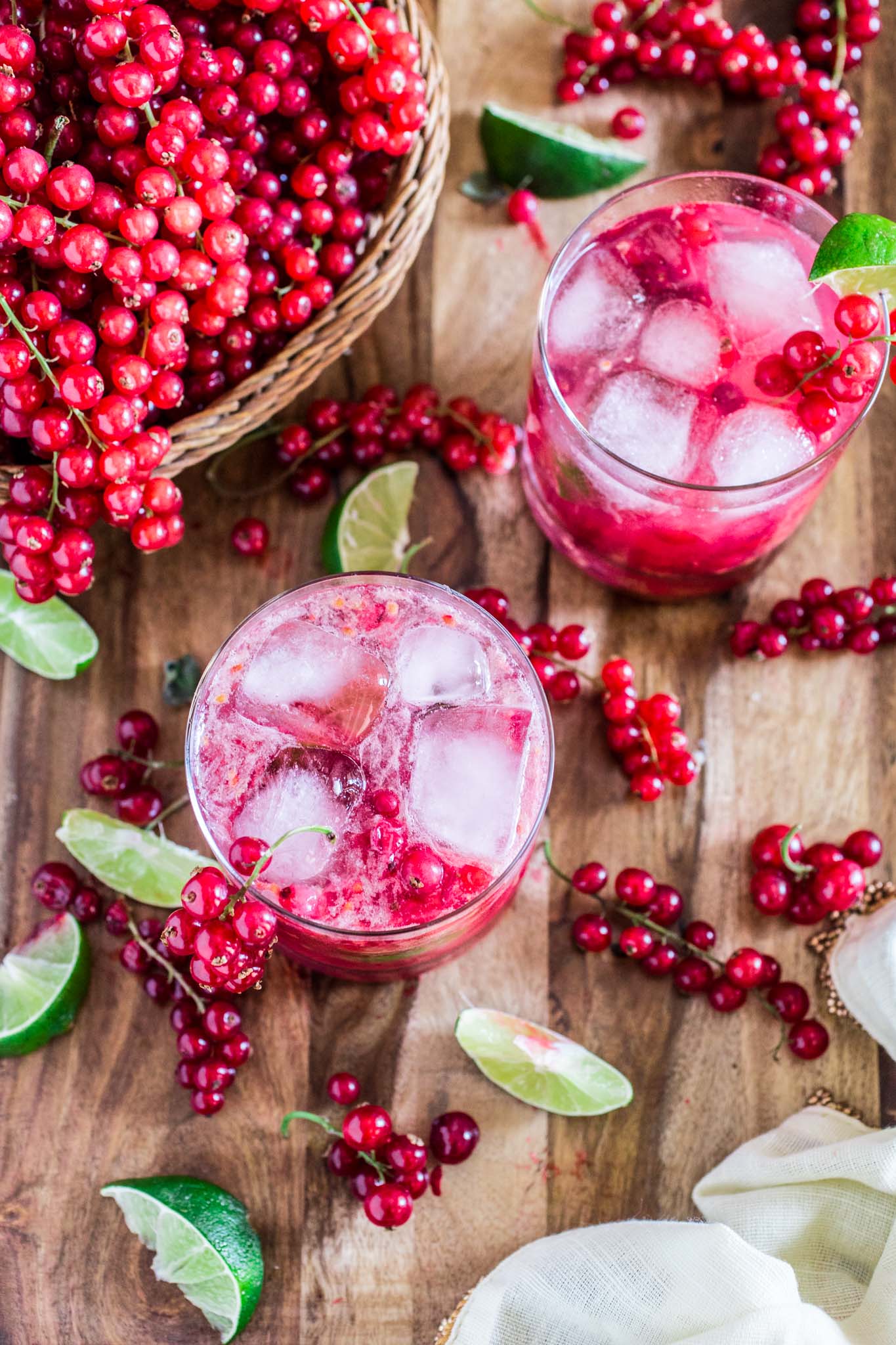 Red Currant Caipirinha | www.oliviascuisine.com | This red currant twist on a classic lime Caipirinha might be my new favorite summertime cocktail! Sour, sweet and as strong as you can take it. There's really no better way to beat the heat! (Sponsored by HBF International.)