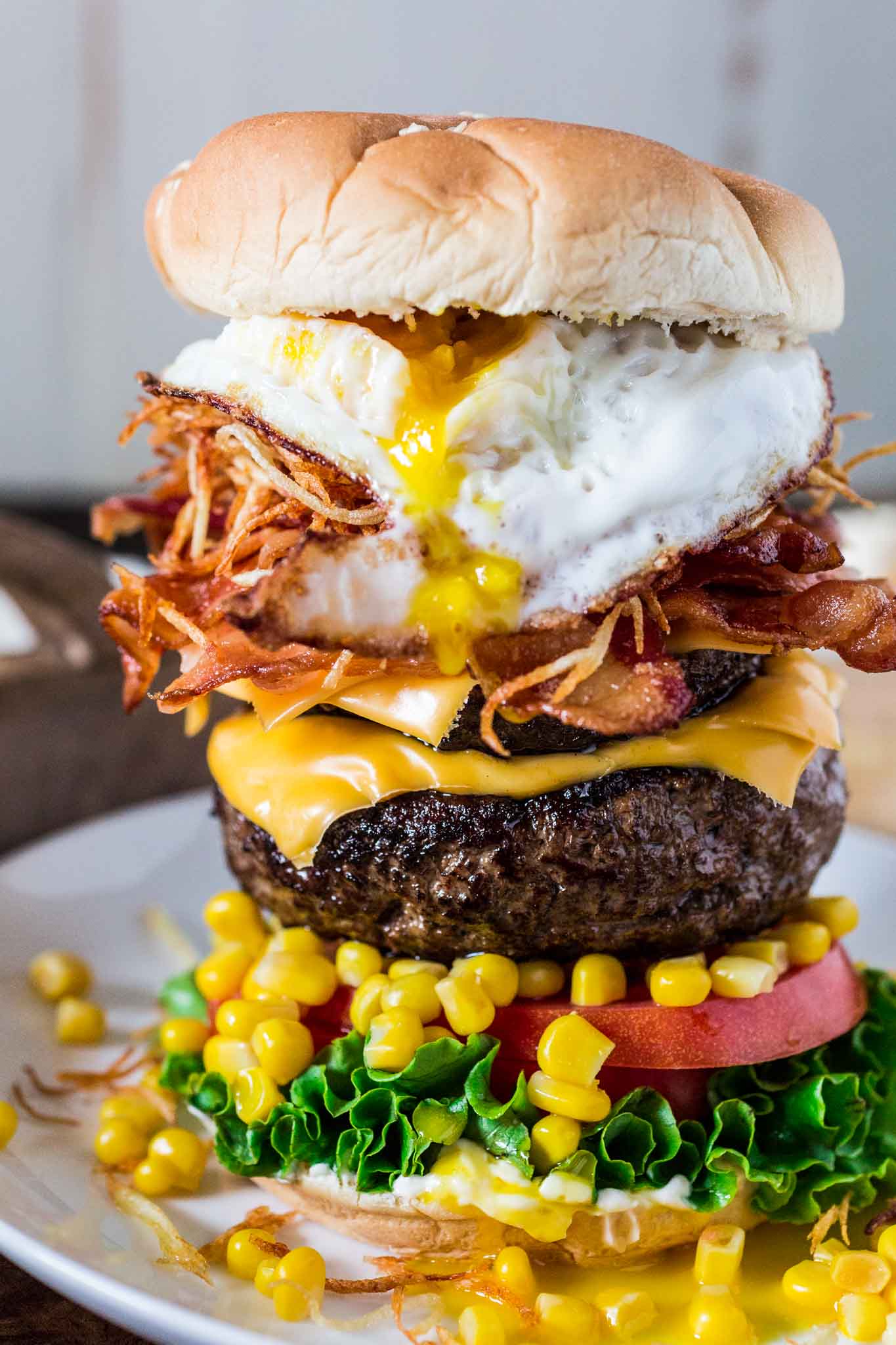 Brazilian Epic Burger with Egg | www.oliviascuisine.com | This monstrous burger is not for the faint of heart. Piled high with two burger patties and an assortment of bold toppings, no burger is more EPIC than this!