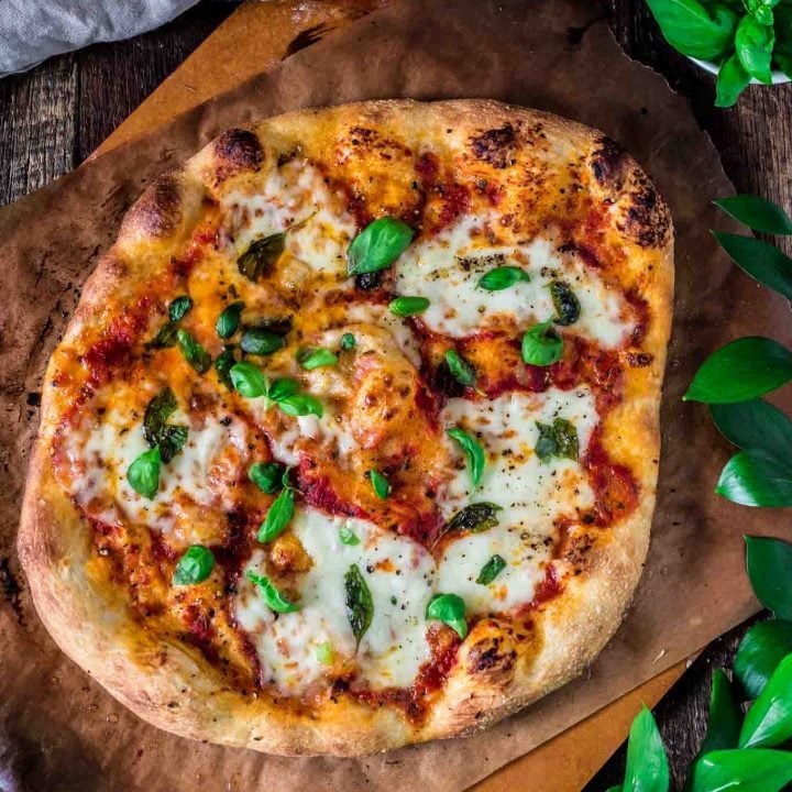 Classic Pizza Margherita | www.oliviascuisine.com | This delicious Margherita pizza is proof that some of the best things in life are the simplest. Only a few fresh ingredients create this iconic pizza from Naples. (In partnership with @Mezzetta.)