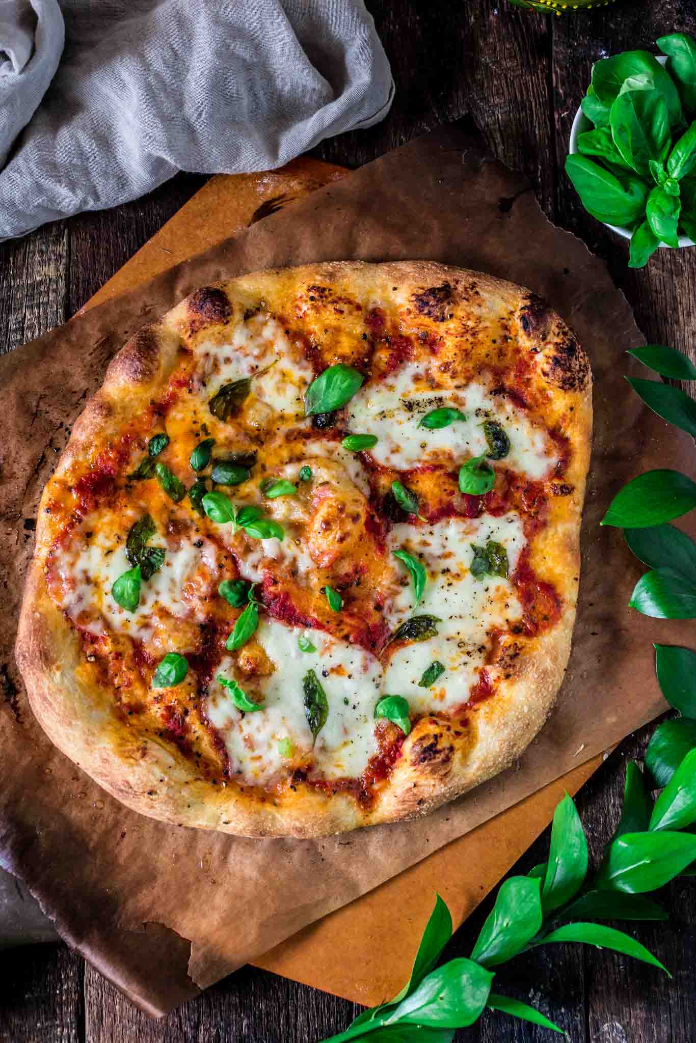 Classic Pizza Margherita | www.oliviascuisine.com | This delicious Margherita pizza is proof that some of the best things in life are the simplest. Only a few fresh ingredients create this iconic pizza from Naples. (In partnership with @Mezzetta.)