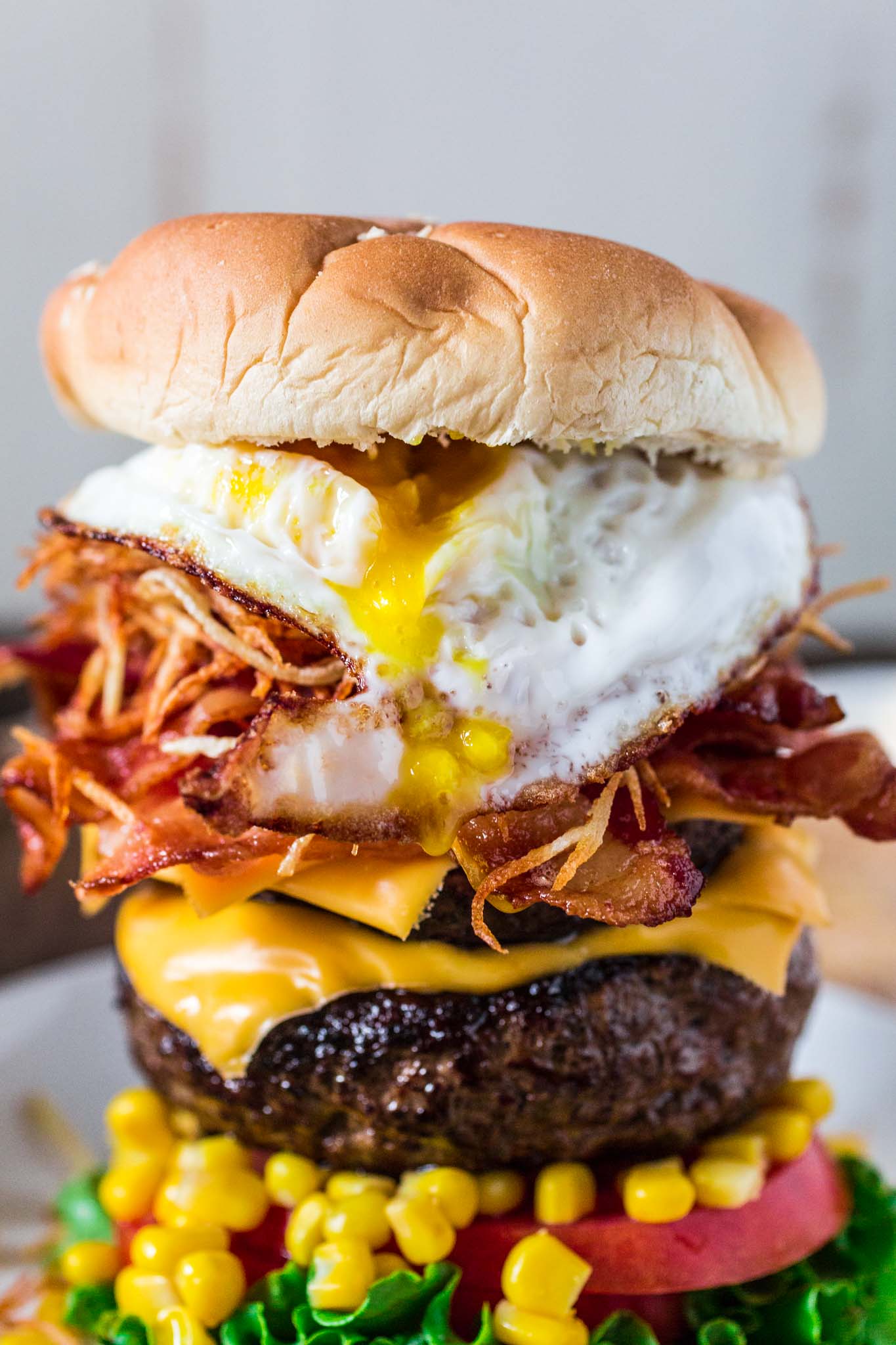 Brazilian Epic Burger with Egg | www.oliviascuisine.com | This monstrous burger is not for the faint of heart. Piled high with two burger patties and an assortment of bold toppings, no burger is more EPIC than this!