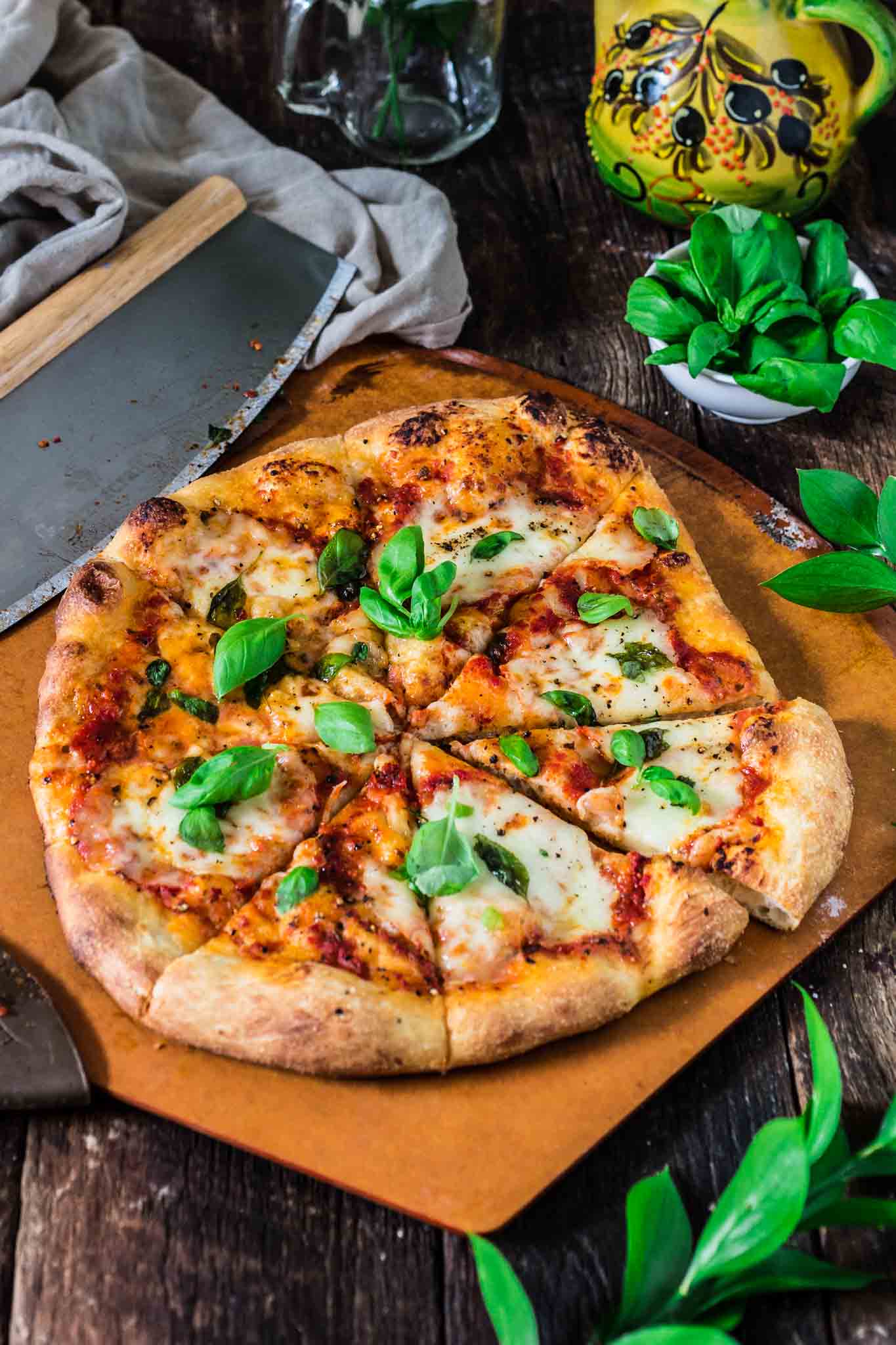 Classic Pizza Margherita | www.oliviascuisine.com | This delicious Margherita pizza is proof that some of the best things in life are the simplest. Only a few fresh ingredients create this iconic pizza from Naples. (In partnership with @Mezzetta.)