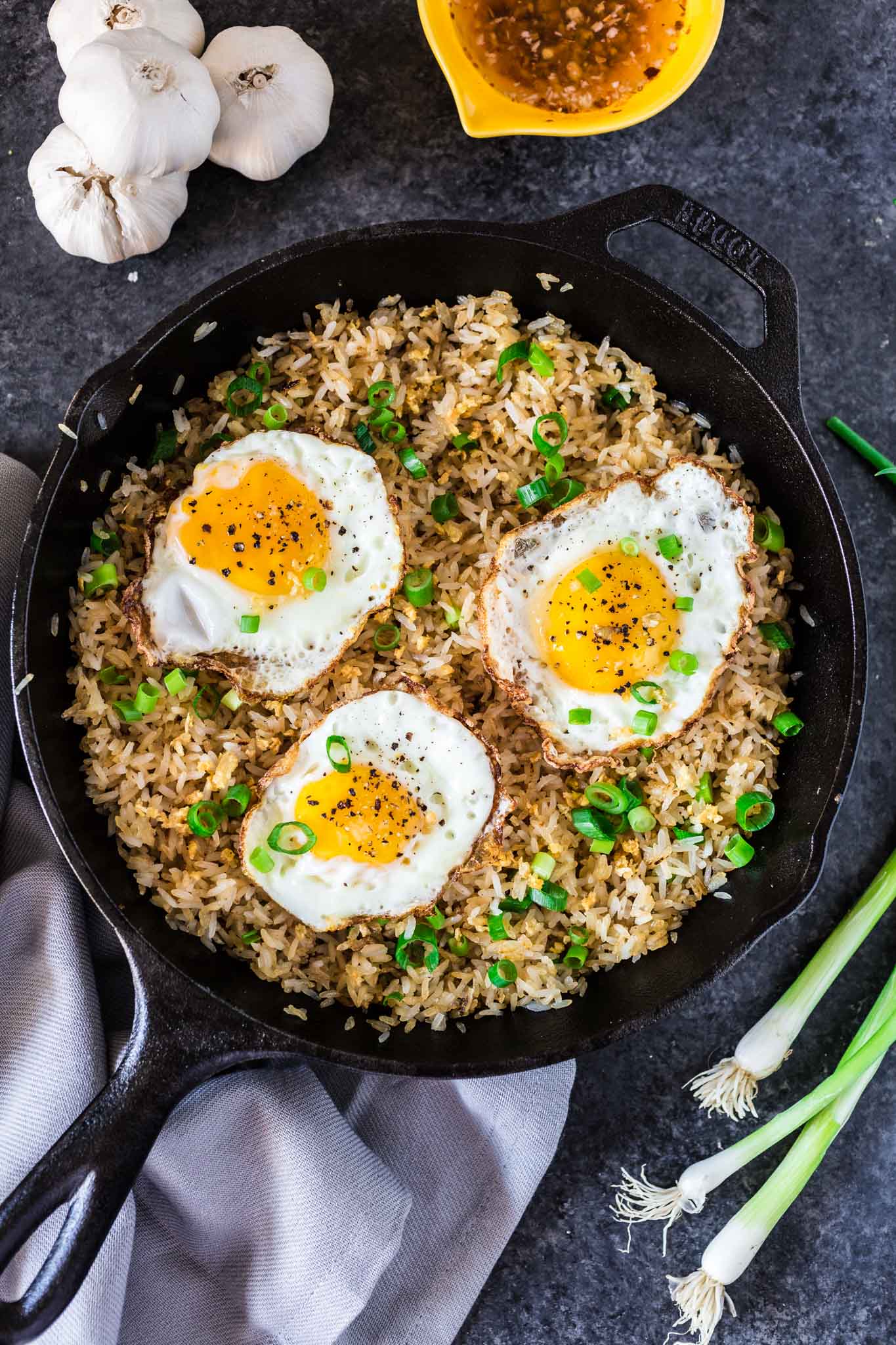 Filipino Garlic Fried Rice | www.oliviascuisine.com | Sinangag, or Garlic Fried Rice, is a popular Filipino breakfast, often served with a fried egg on top and a drizzle of vinegar sauce. Don't have a stomach for rice and garlic in the morning? No problem! This dish is also amazing for lunch or as a side for dinner.