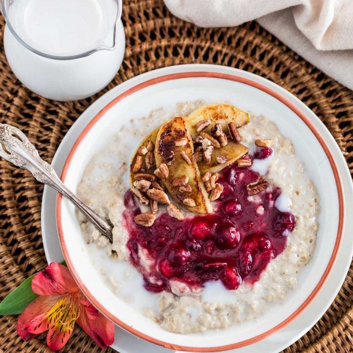 Christmas Oats Porridge with Cranberry Sauce, Apples and Pecans | www.oliviascuisine.com | Waking up to a special breakfast on Christmas morning is a must! This festive porridge is not only delicious but also heartwarming. Sweet, tart, creamy and crunchy goodness. What else could we wish for?