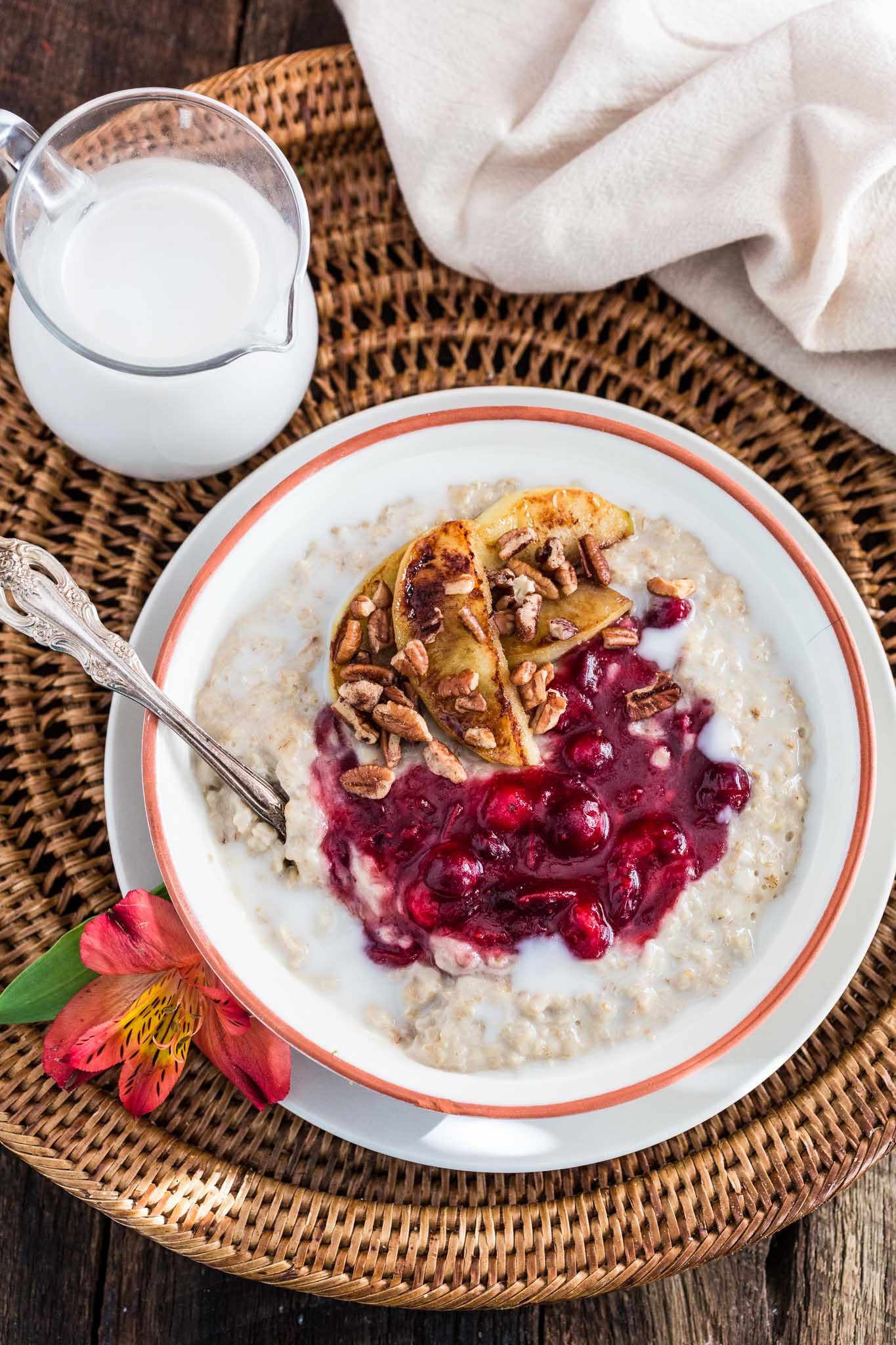 Christmas Oats Porridge with Cranberry Sauce, Apples and Pecans | www.oliviascuisine.com | Waking up to a special breakfast on Christmas morning is a must! This festive porridge is not only delicious but also heartwarming. Sweet, tart, creamy and crunchy goodness. What else could we wish for? 