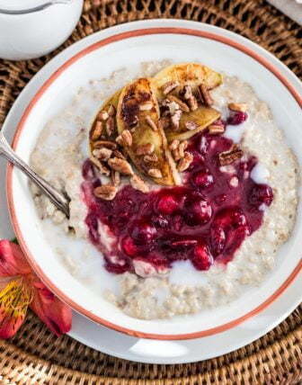 Christmas Oats Porridge with Cranberry Sauce, Apples and Pecans
