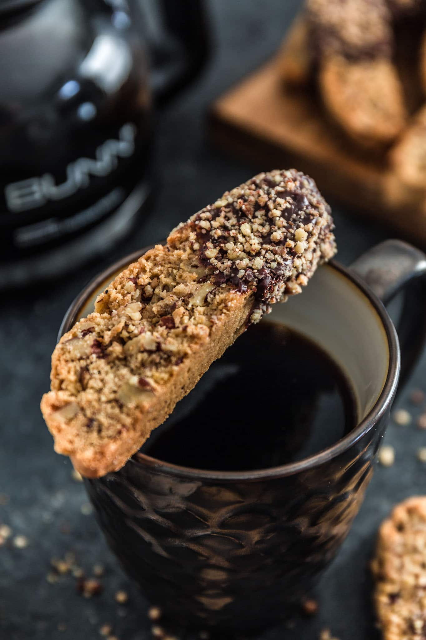 Chocolate Dipped Cinnamon Pecan Biscotti | www.oliviascuisine.com | Lighter than Italian biscotti, these Chocolate Dipped Cinnamon Pecan Biscotti are crisp, tender and filled with some of my favorite holiday noms: cinnamon, pecan and chocolate! Perfect to give out as holiday gifts or just to dunk into your coffee. 