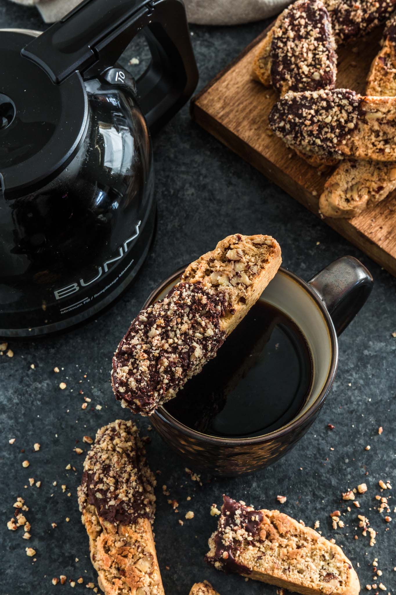 Chocolate Dipped Cinnamon Pecan Biscotti | www.oliviascuisine.com | Lighter than Italian biscotti, these Chocolate Dipped Cinnamon Pecan Biscotti are crisp, tender and filled with some of my favorite holiday noms: cinnamon, pecan and chocolate! Perfect to give out as holiday gifts or just to dunk into your coffee. 