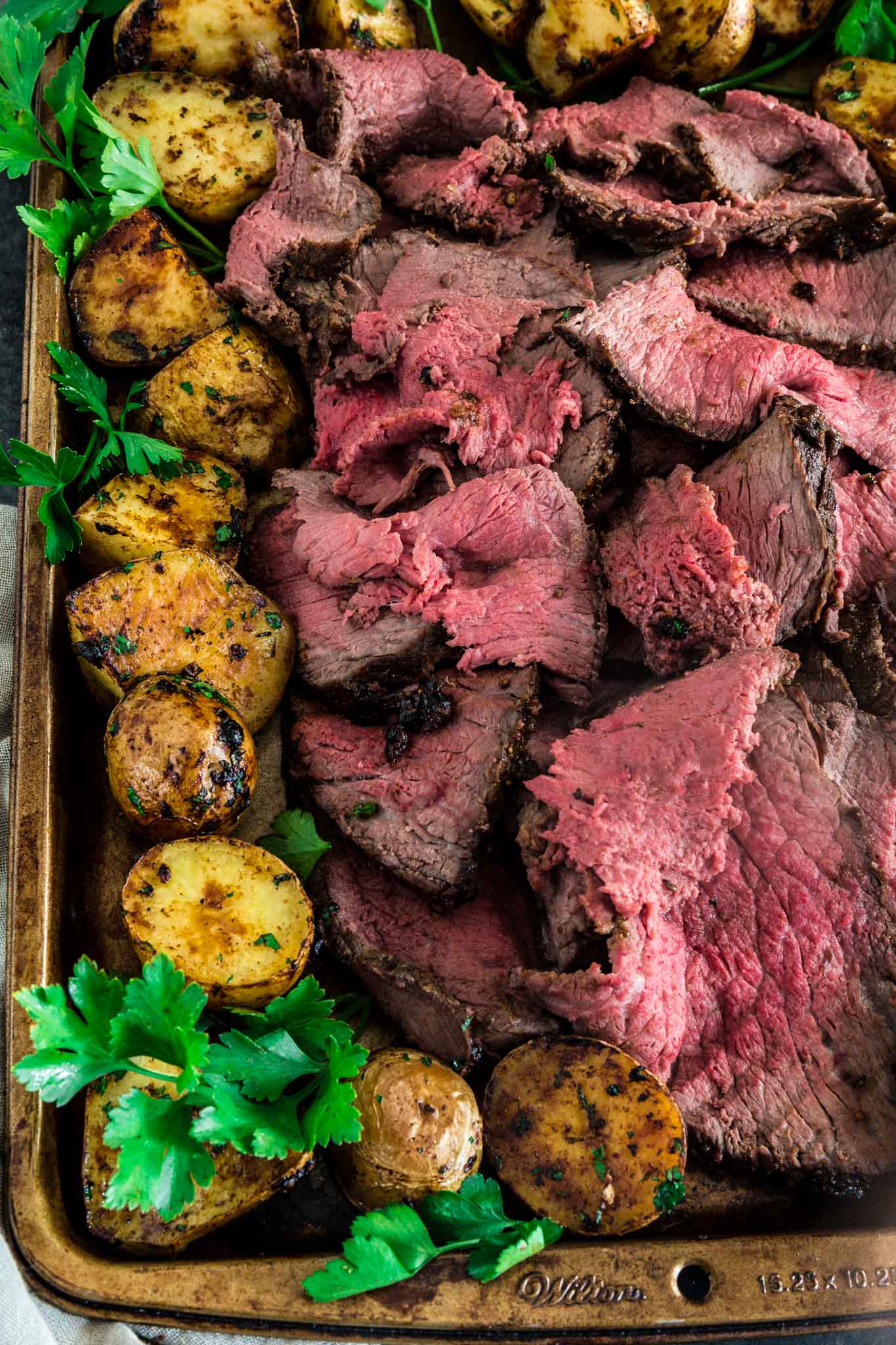 Balsamic Mustard Roast Beef | www.oliviascuisine.com | No holiday table is complete without a beautiful centerpiece roast beef. Glazed with balsamic mustard, this version is both simple and impressive. It will quickly become your go-to recipe for any special occasion!