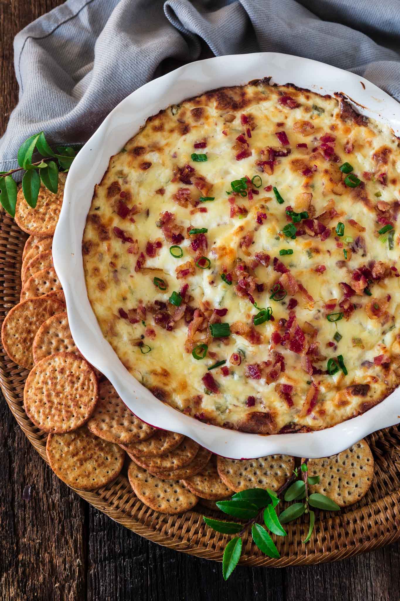 Hot Smoked Gouda Bacon Dip | www.oliviascuisine.com | Creamy, gooey and loaded with everyone's favorite ingredient, bacon, this Hot Smoked Gouda Bacon Dip is destined to be the star of your holiday party! Pair it with some good wine and you're on the road to success.