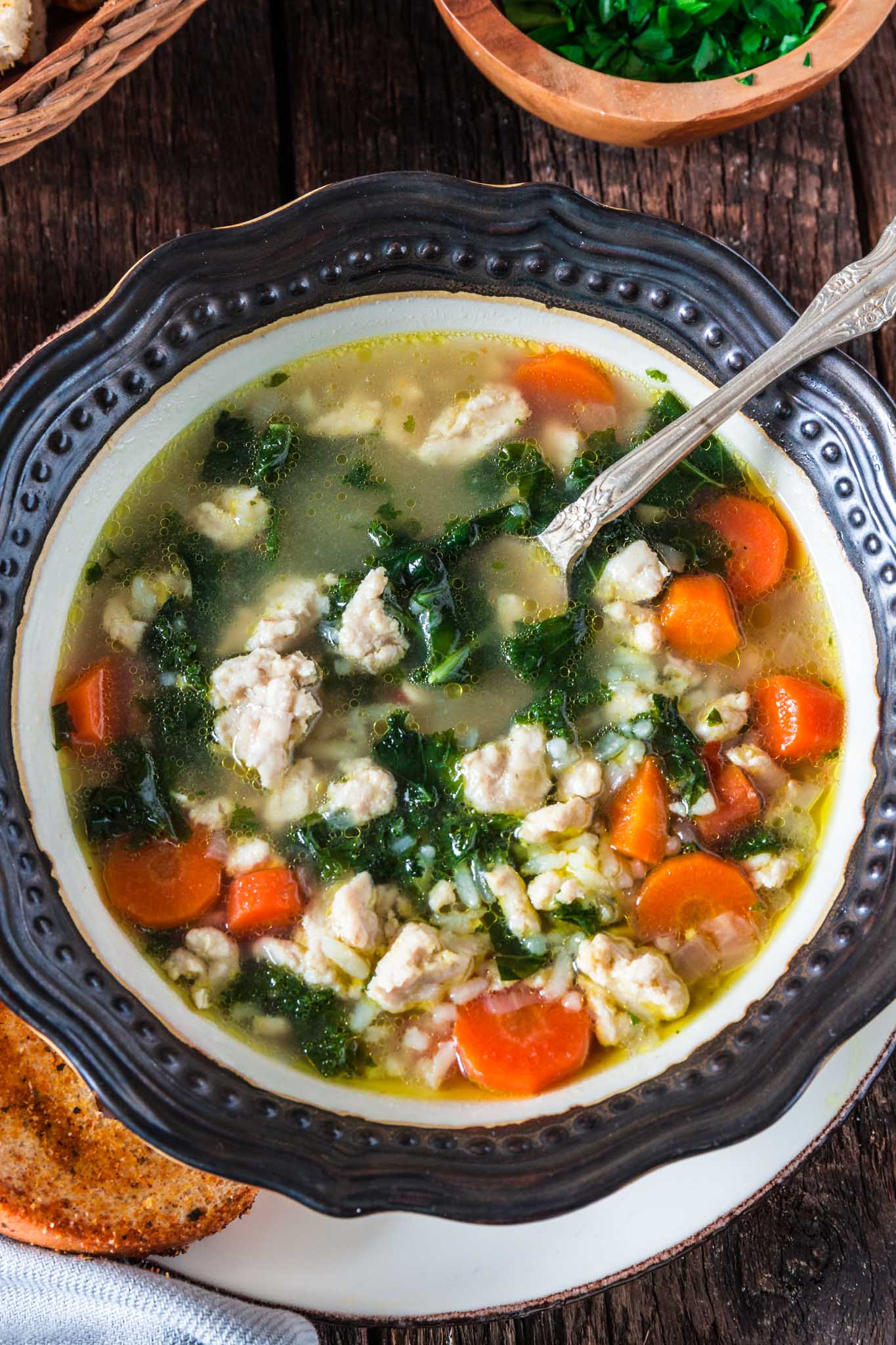 Turkey, Kale and Rice Soup | www.oliviascuisine.com | Nothing warms you up like a cozy bowl of Turkey, Kale and Rice Soup! Loaded with nutrients and low in fat, so you can stay true to your "eating healthy" New Year resolutions. (Sponsored by @JennieO.)