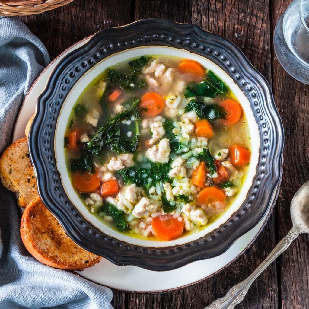 Turkey, Kale and Rice Soup | www.oliviascuisine.com | Nothing warms you up like a cozy bowl of Turkey, Kale and Rice Soup! Loaded with nutrients and low in fat, so you can stay true to your "eating healthy" New Year resolutions. (Sponsored by @JennieO.)