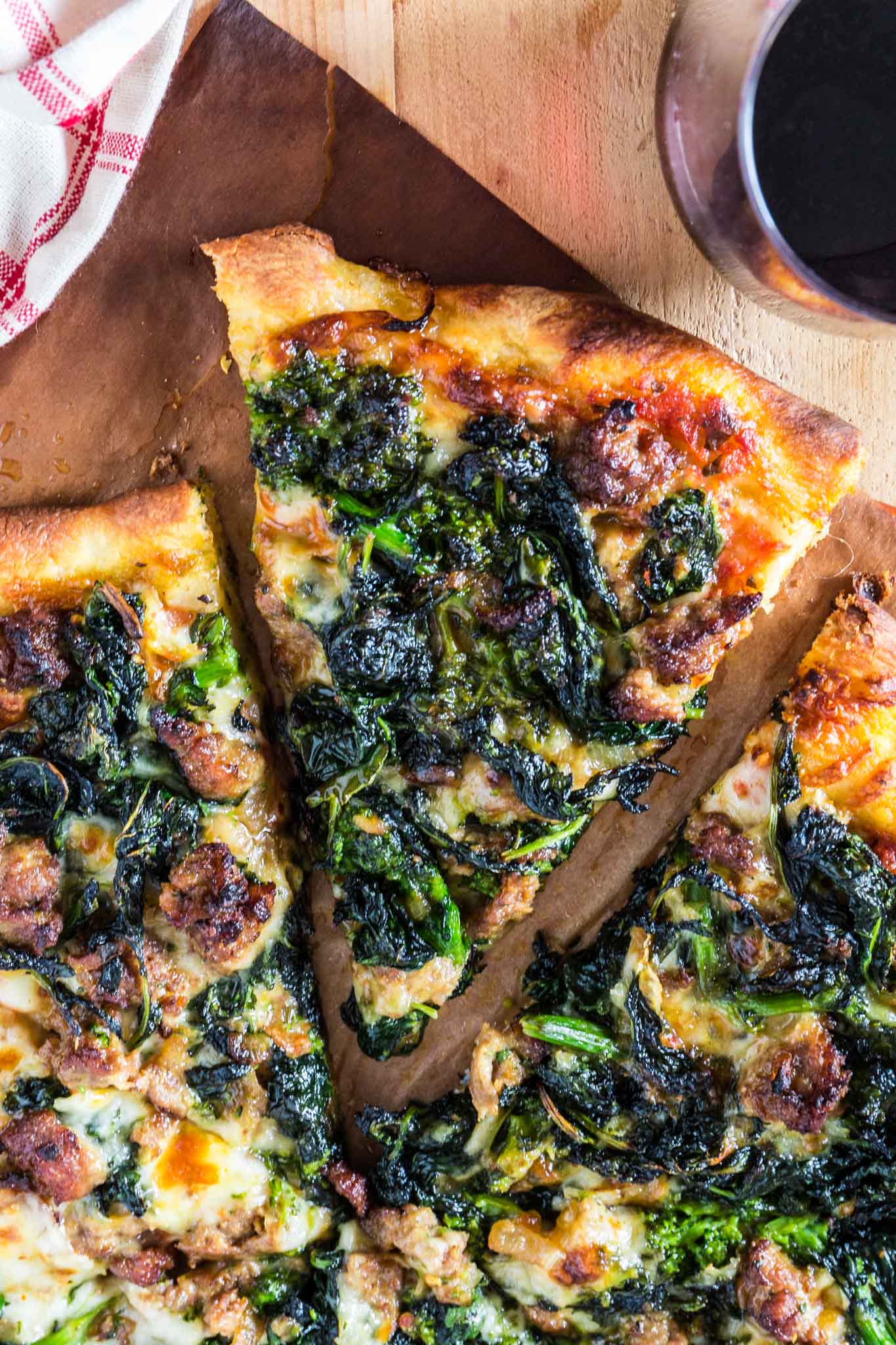 Turkey Sausage and Broccoli Rabe Pizza | www.oliviascuisine.com | This Turkey Sausage and Broccoli Rabe Pizza is one of the best pizzas you will ever taste. The slightly bitter and peppery broccoli rabe combined with the smokiness of the provolone cheese and the subtle sweetness from the turkey sausage create an explosion of flavor that will wow even those who turn their noses at broccoli rabe. You simply must try this! (Recipe by @oliviascuisine).