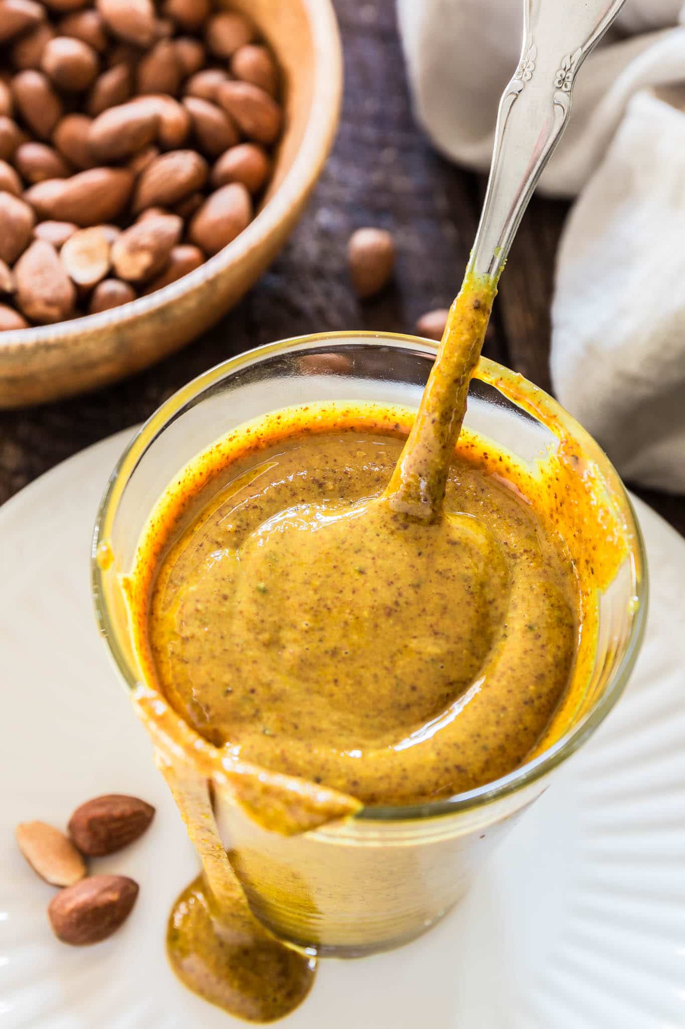 Turmeric Almond Butter | www.oliviascuisine.com | Nut butter lovers, rejoice! This almond butter mixed with turmeric is everything you’re looking for: creamy, salty and good for you, loaded with health benefits from both the almonds and the turmeric.