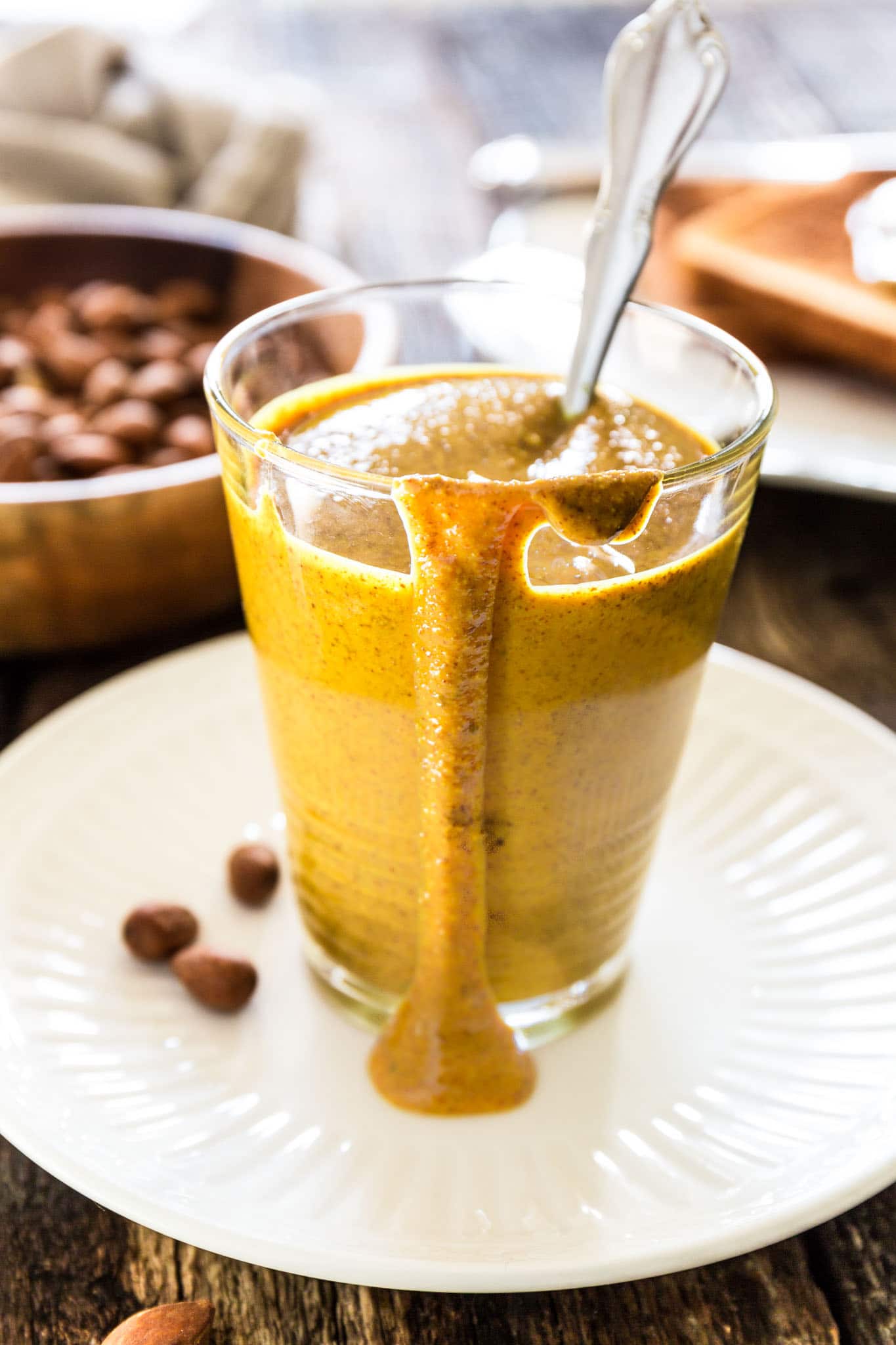 Turmeric Almond Butter | www.oliviascuisine.com | Nut butter lovers, rejoice! This almond butter mixed with turmeric is everything you’re looking for: creamy, salty and good for you, loaded with health benefits from both the almonds and the turmeric.