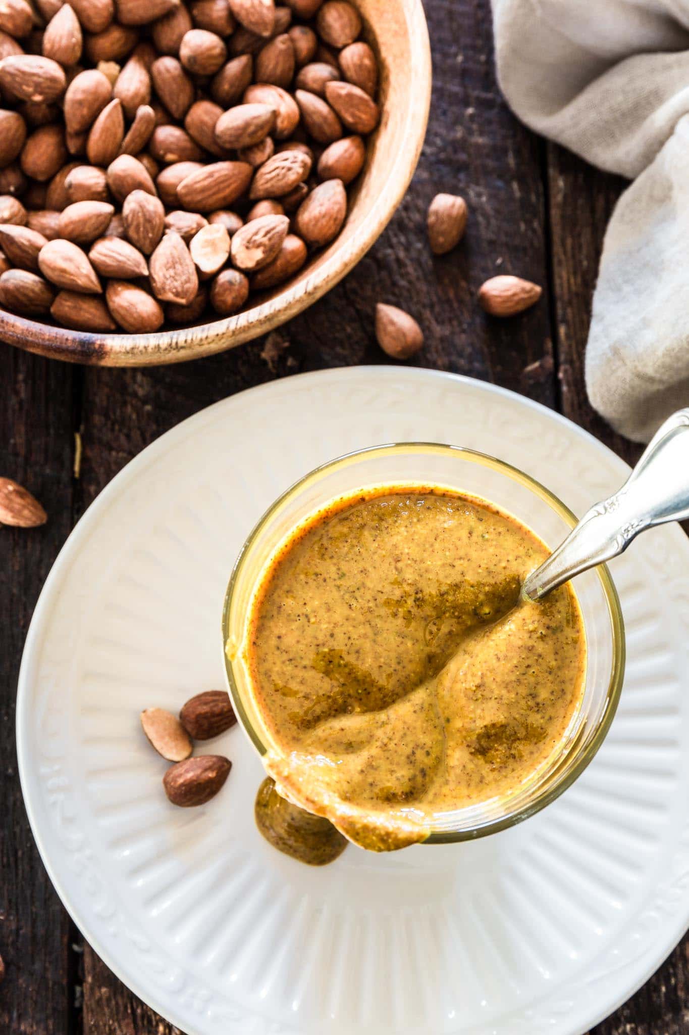 Turmeric Almond Butter | www.oliviascuisine.com | Nut butter lovers, rejoice! This almond butter mixed with turmeric is everything you’re looking for: creamy, salty and good for you, loaded with health benefits from both the almonds and the turmeric.
