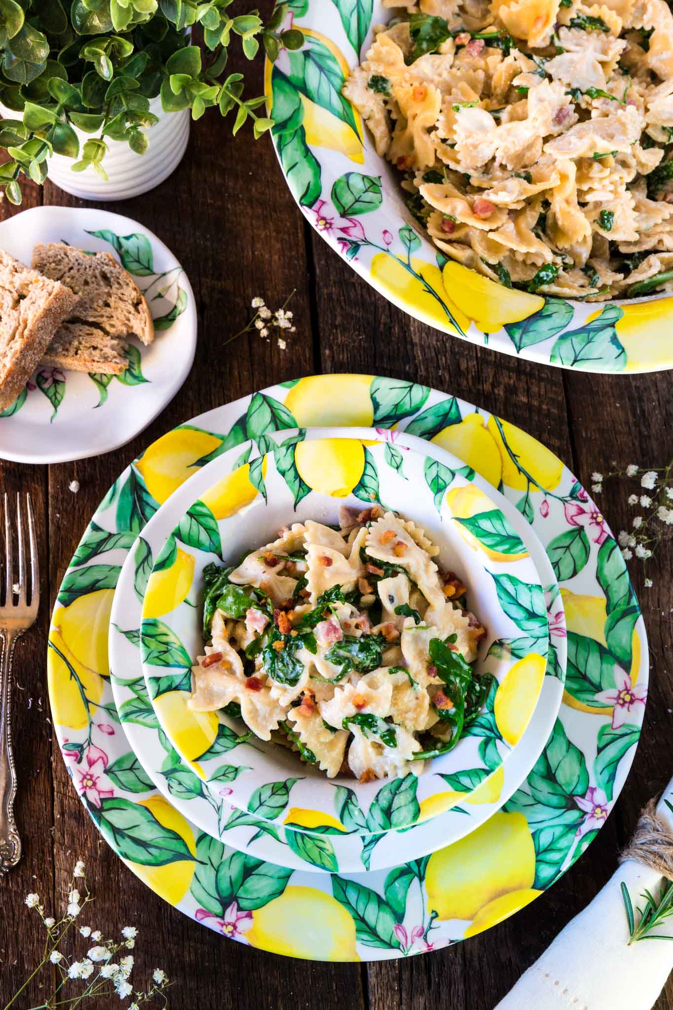 Farfalle with Pancetta, Arugula and Lemon Cream Sauce | www.oliviascuisine.com | A pasta dish that embodies all the things we love about spring and summer. Fresh, colorful and tied together with a lip smacking lemon cream sauce that is to die for! Featuring the beautiful Q Squared NYC's Limonata Collection. (Recipe by @oliviascuisine.)