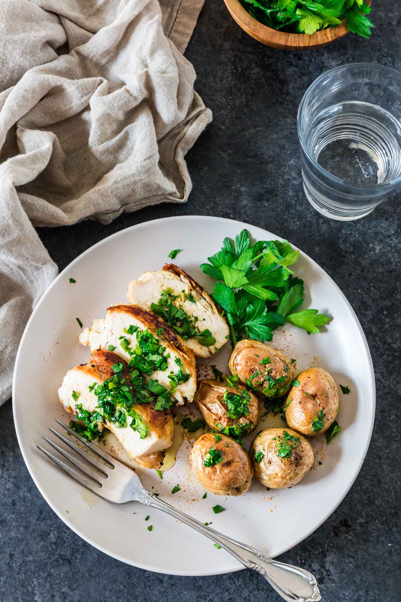 Sheet Pan Chicken with Spicy Potatoes (Batata Harra) | www.oliviascuisine.com | The easiest meal ever consists of juicy and perfectly seasoned chicken breasts served with batata harra, baked Lebanese spicy potatoes that melt in your mouth while enticing your tastebuds. (Recipe by @oliviascuisine.)