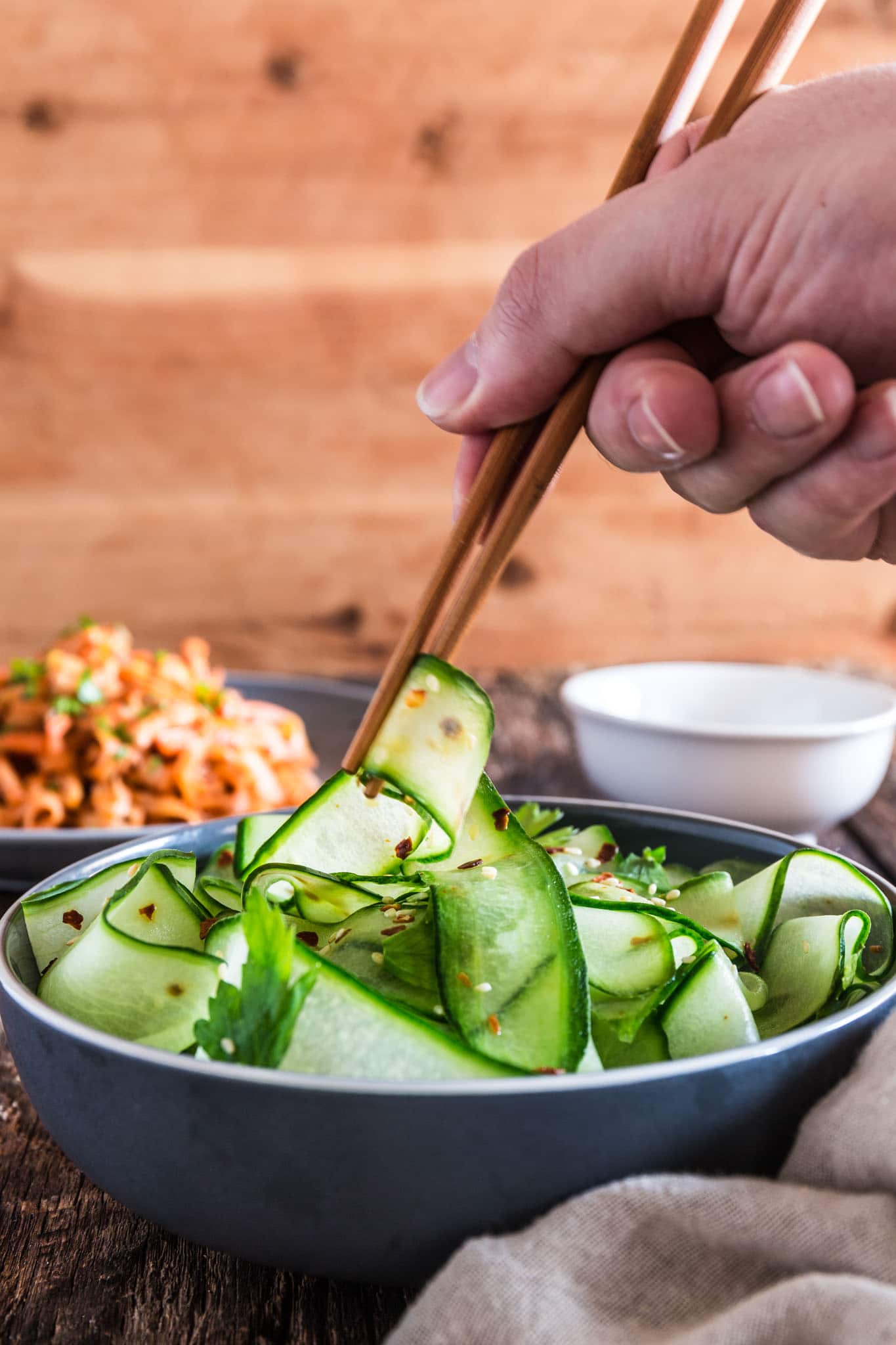 Thai Cucumber Salad with Sesame Ginger Dressing | www.oliviascuisine.com | Some of the best pleasures in life are the simple ones, like this refreshing and light Thai Cucumber Salad. It comes together in less than 5 minutes, so you won't have to miss any second of that sacred summer sunshine! (Recipe by @oliviascuisine.)