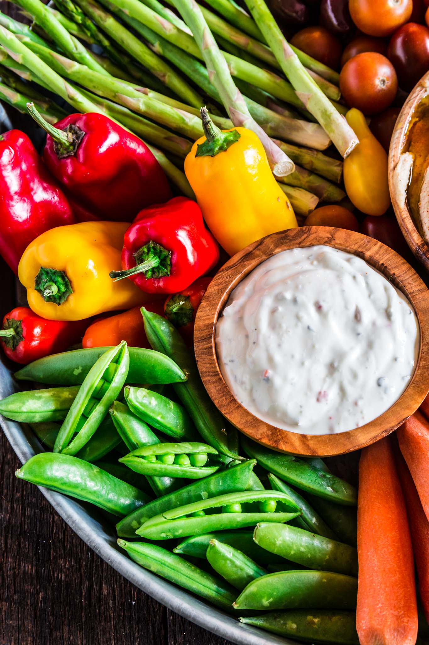 How to Assemble a Crudité Platter | www.oliviascuisine.com | Learn how to set up a Crudité Platter that your guests will actually enjoy, filled with fresh and seasonal veggies and a few delicious dips, olives and nuts. Follow this quick guide and I guarantee you will find even the pickiest of eaters hanging around this awesome vegetable tray! (Recipe and photos by @oliviascuisine)