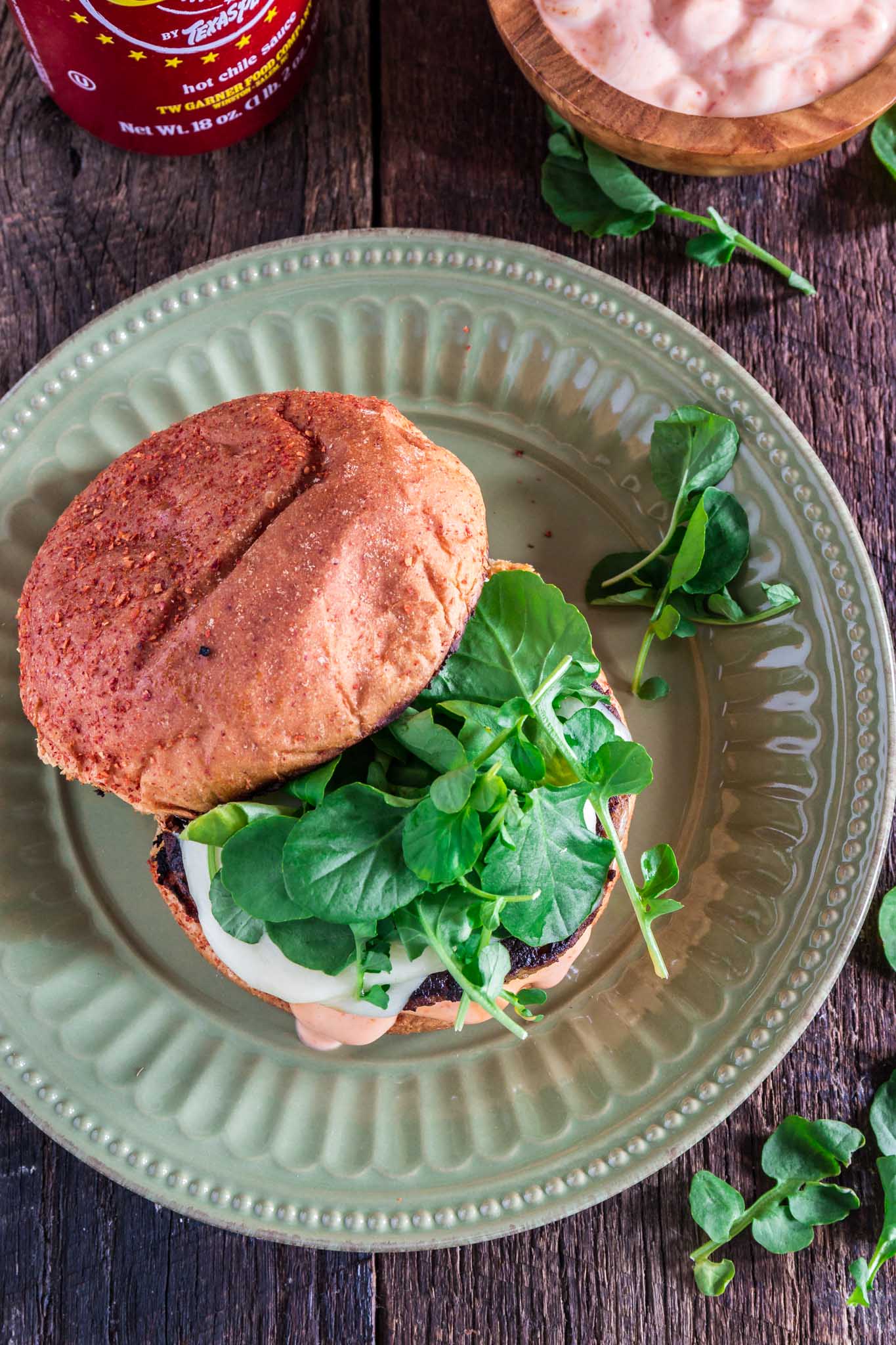 Sriracha Turkey Burger | www.oliviascuisine.com | A juicy Sriracha turkey burger topped with spicy and creamy Sriracha mayo, Swiss cheese and watercress! Who could resist that?