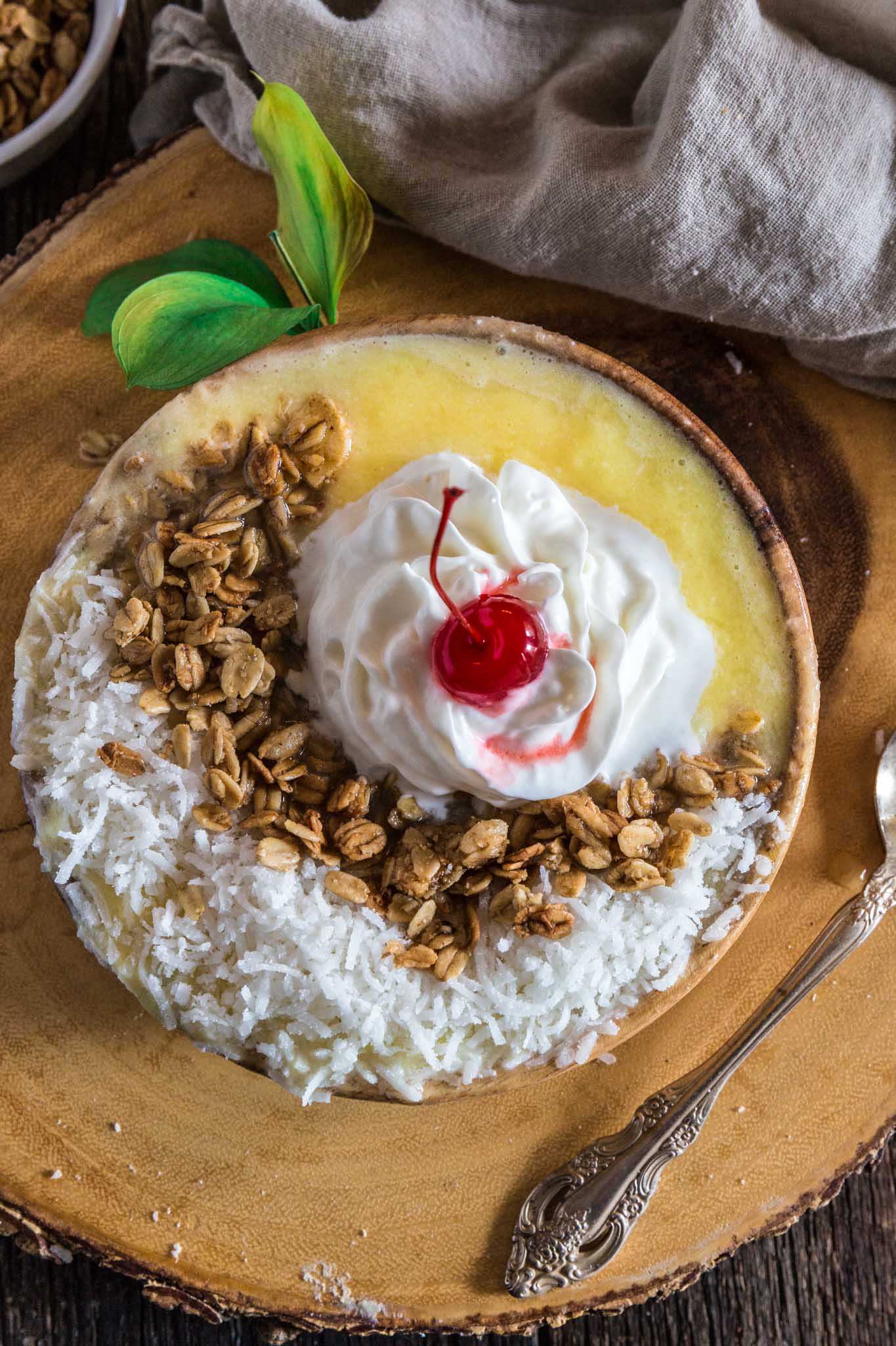 Pina Colada Smoothie Bowl | www.oliviascuisine.com | Can't escape to a beach somewhere at the moment? No problem! Make this Pina Colada Smoothie Bowl and you'll feel like you're in a tropical paradise. (Recipe and food photography by @oliviascuisine.)