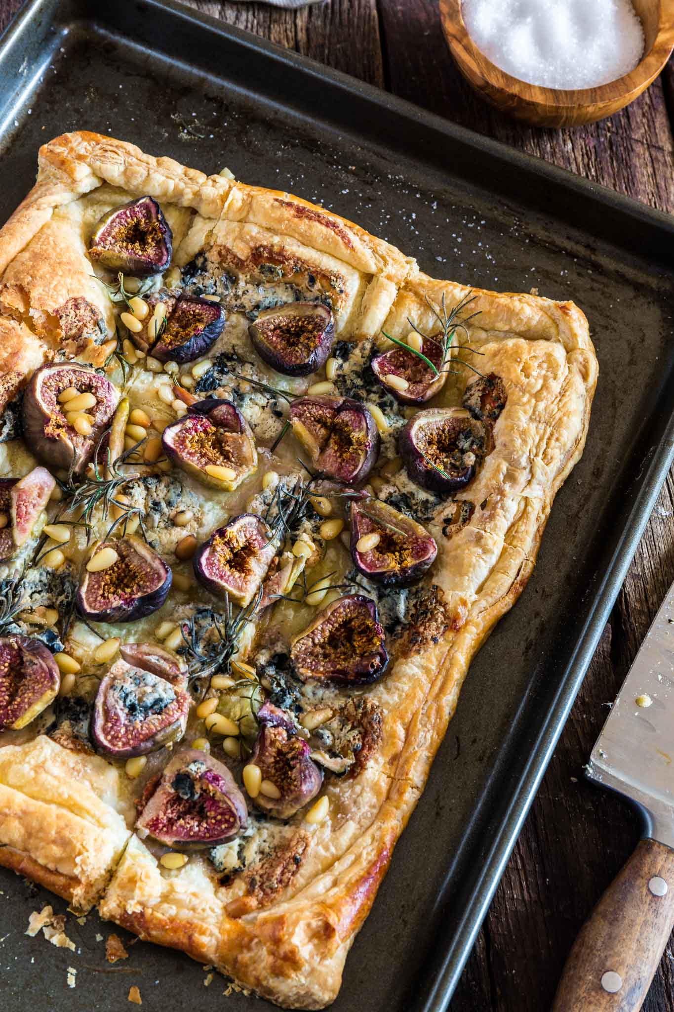 Blue Cheese Fig Tart | www.oliviascuisine.com | A delicious savory and sweet tart, made with blue cheese, fresh figs, rosemary, pine nuts, sea salt and a touch of honey. Serve it for brunch, as an appetizer and/or as a snack and be ready for your tastebuds to start dancing the can-can!