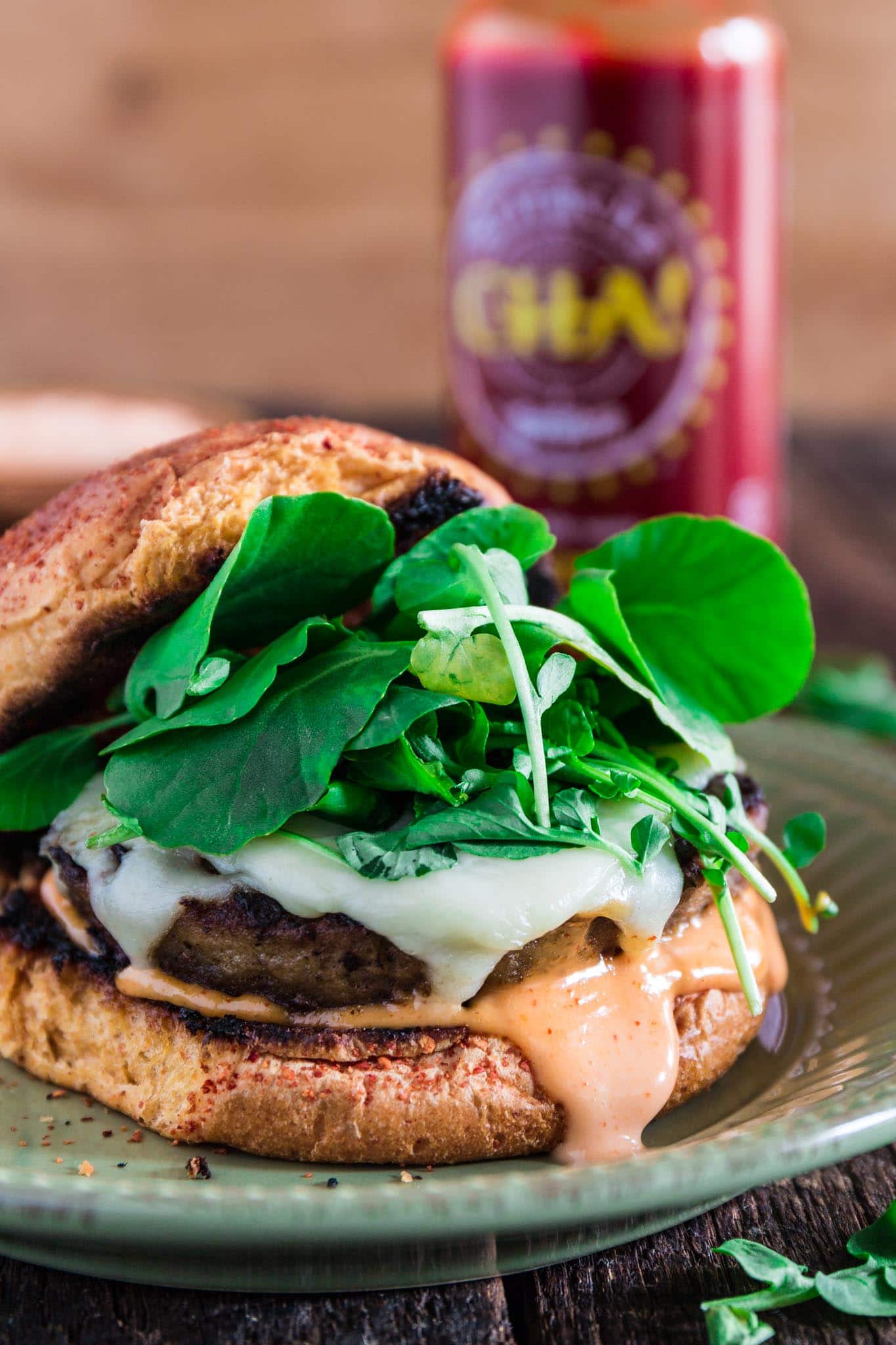 Sriracha Turkey Burger | www.oliviascuisine.com | A juicy Sriracha turkey burger topped with spicy and creamy Sriracha mayo, Swiss cheese and watercress! Who could resist that?