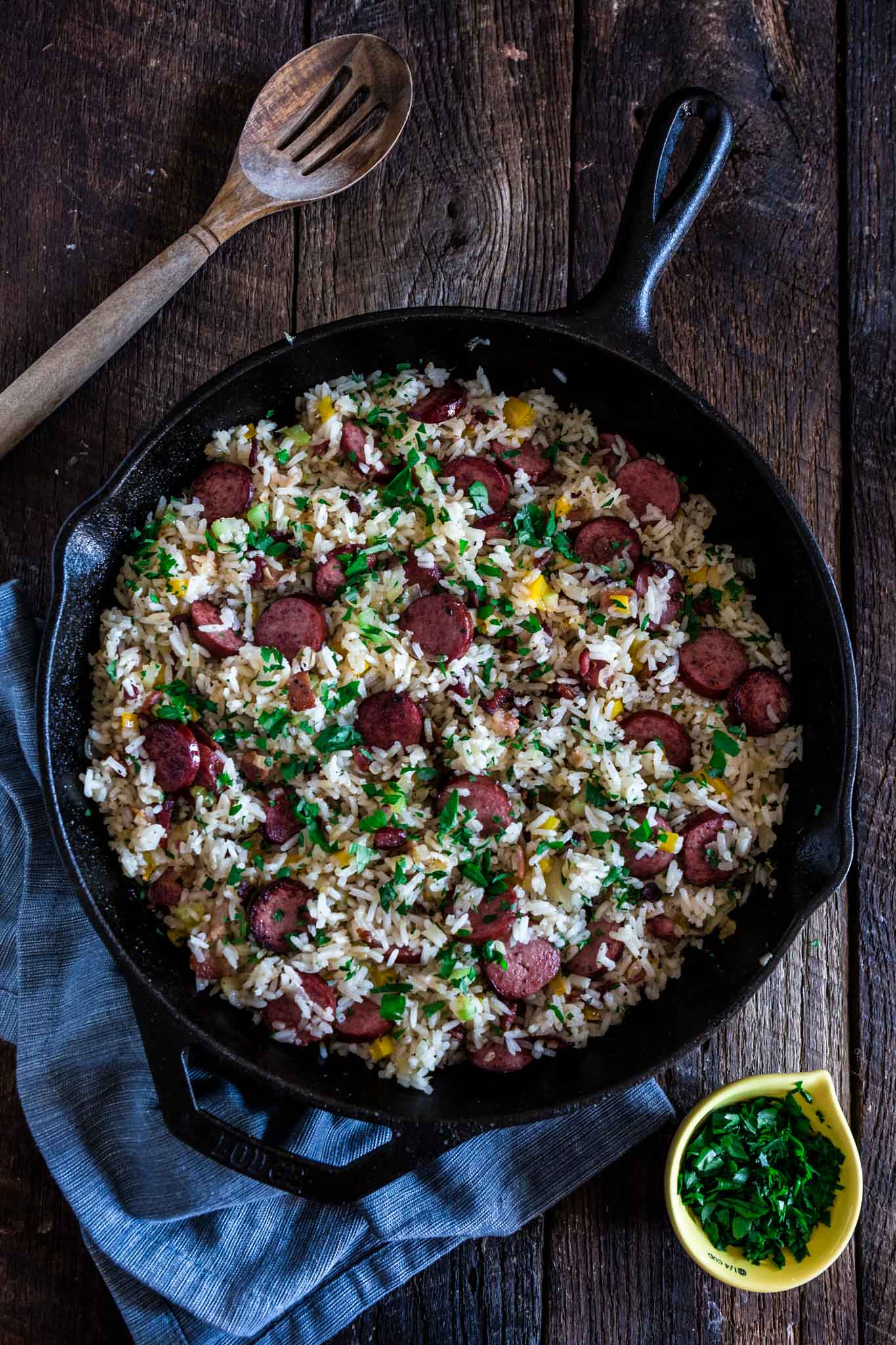 Dirty Rice with Smoked Sausage and Bacon | www.oliviascuisine.com | This spin on the classic Cajun/Creole Dirty Rice is made with bacon and smoked sausage instead of the traditional chicken liver. Easy, hearty and perfect as a weeknight meal or as a side dish for a special occasion, like Thanksgiving! (Recipe and Food Photography by @oliviascuisine.)