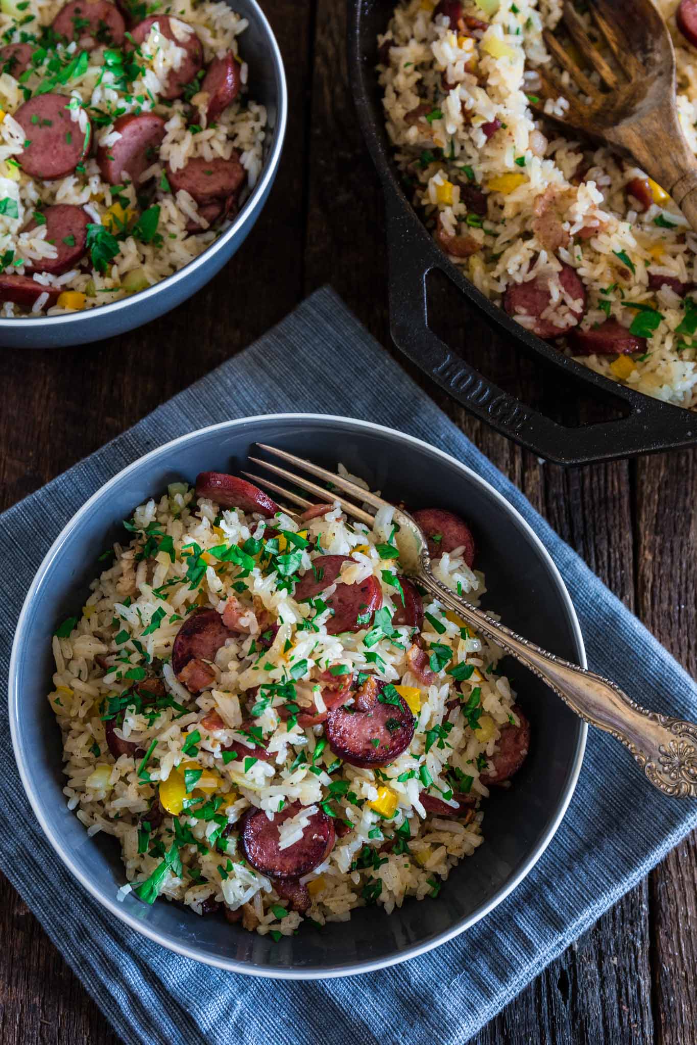 Dirty Rice with Smoked Sausage and Bacon | www.oliviascuisine.com | This spin on the classic Cajun/Creole Dirty Rice is made with bacon and smoked sausage instead of the traditional chicken liver. Easy, hearty and perfect as a weeknight meal or as a side dish for a special occasion, like Thanksgiving! (Recipe and Food Photography by @oliviascuisine.)