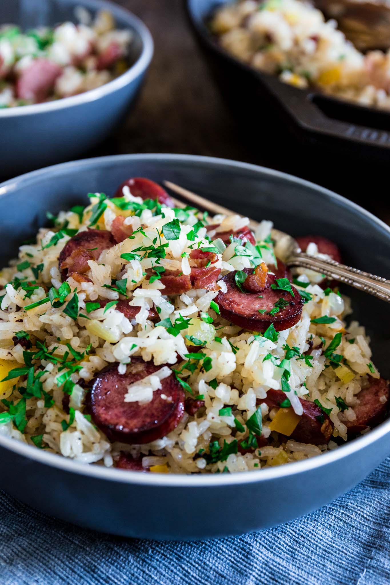 Dirty Rice with Smoked Sausage and Bacon | www.oliviascuisine.com | This spin on the classic Cajun/Creole Dirty Rice is made with bacon and smoked sausage instead of the traditional chicken liver. Easy, hearty and perfect as a weeknight meal or as a side dish for a special occasion, like Thanksgiving! (Recipe and Food Photography by @oliviascuisine.)