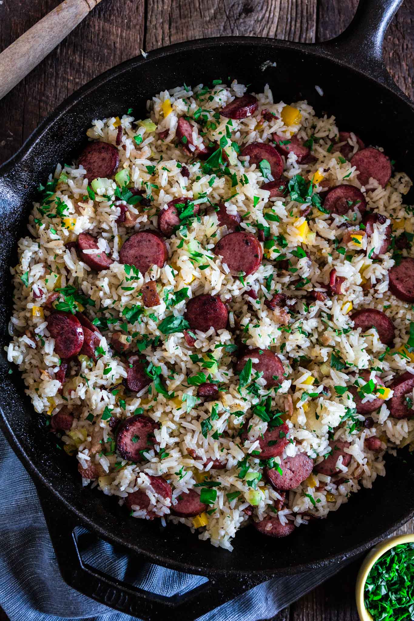 Dirty Rice with Smoked Sausage and Bacon | www.oliviascuisine.com | This spin on the classic Cajun/Creole Dirty Rice is made with bacon and smoked sausage instead of the traditional chicken liver. Easy, hearty and perfect as a weeknight meal or as a side dish for a special occasion, like Thanksgiving! (Recipe and Food Photography by @oliviascuisine.)