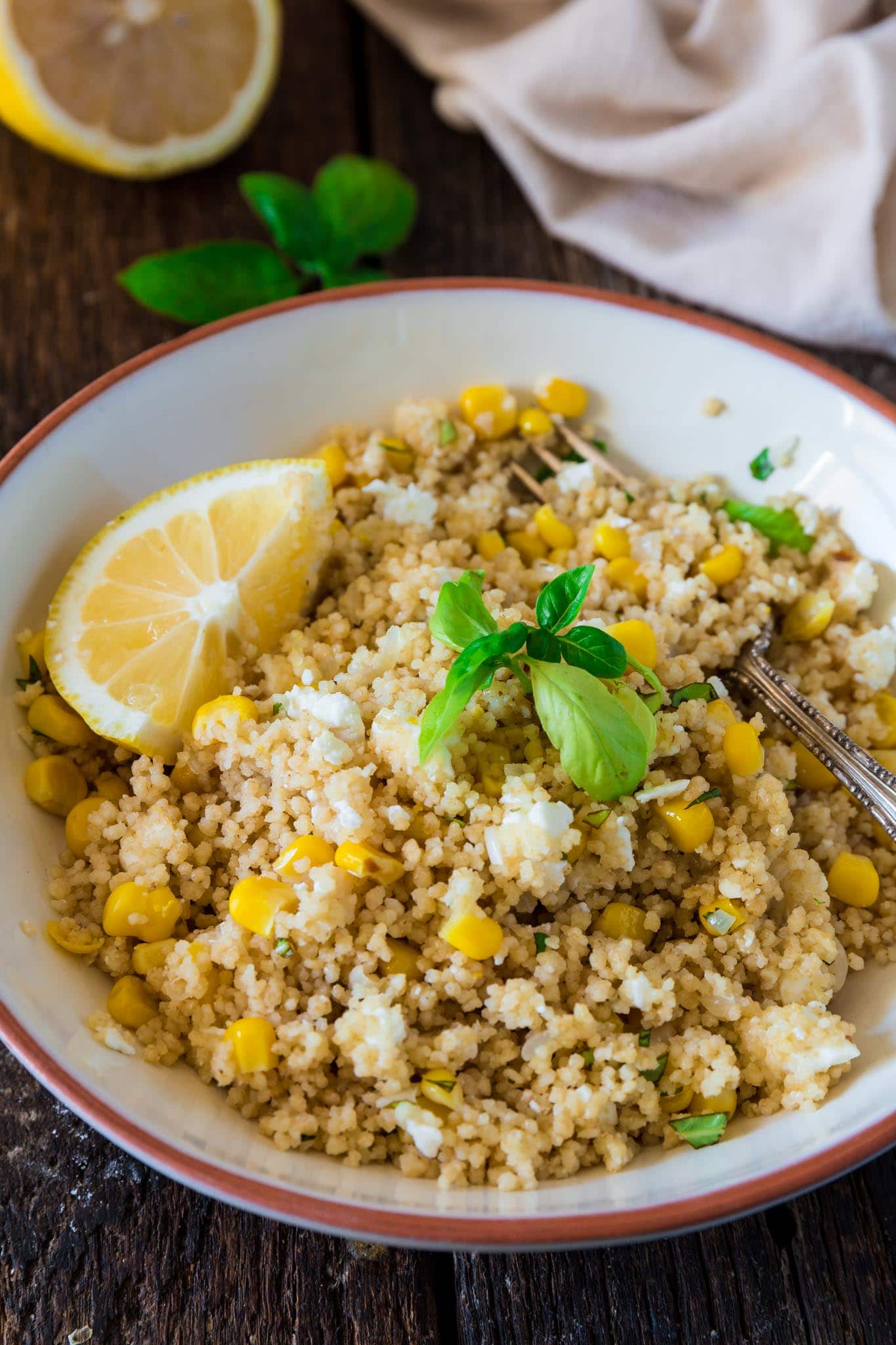 Corn Couscous with Basil, Feta and Lemon | www.oliviascuisine.com | This simple dish, packed with Mediterranean flavors, consists of only 7 main ingredients and is done in about 5 minutes. Serve it warm as a side dish, or cold as a salad. (Recipe and food photography by @oliviascuisine.)