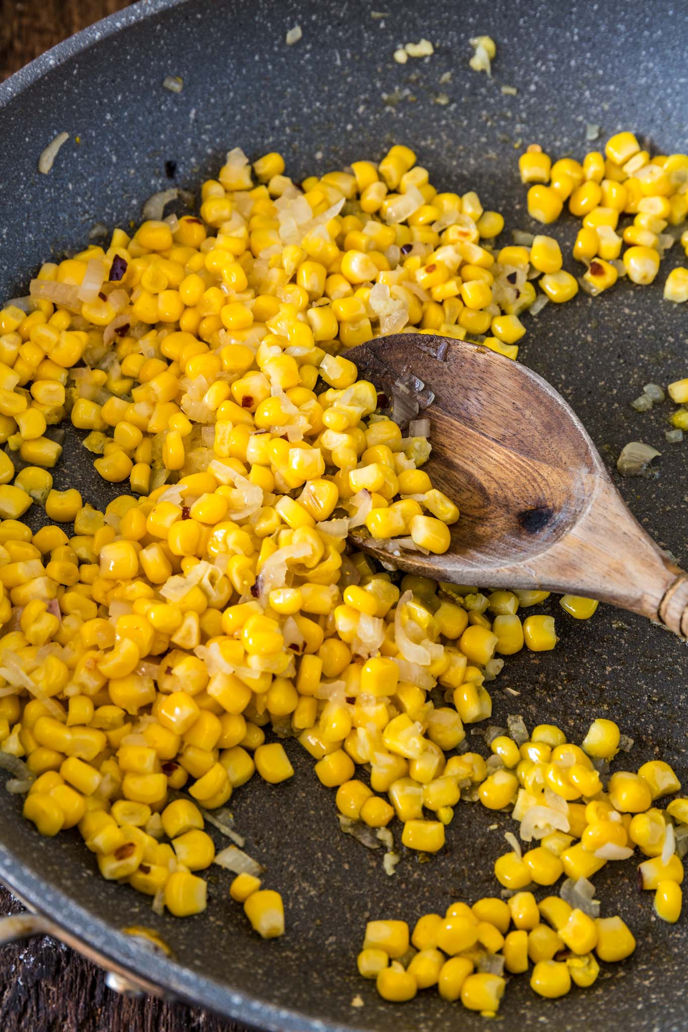 Corn Couscous with Basil, Feta and Lemon | www.oliviascuisine.com | This simple dish, packed with Mediterranean flavors, consists of only 7 main ingredients and is done in about 5 minutes. Serve it warm as a side dish, or cold as a salad. (Recipe and food photography by @oliviascuisine.)