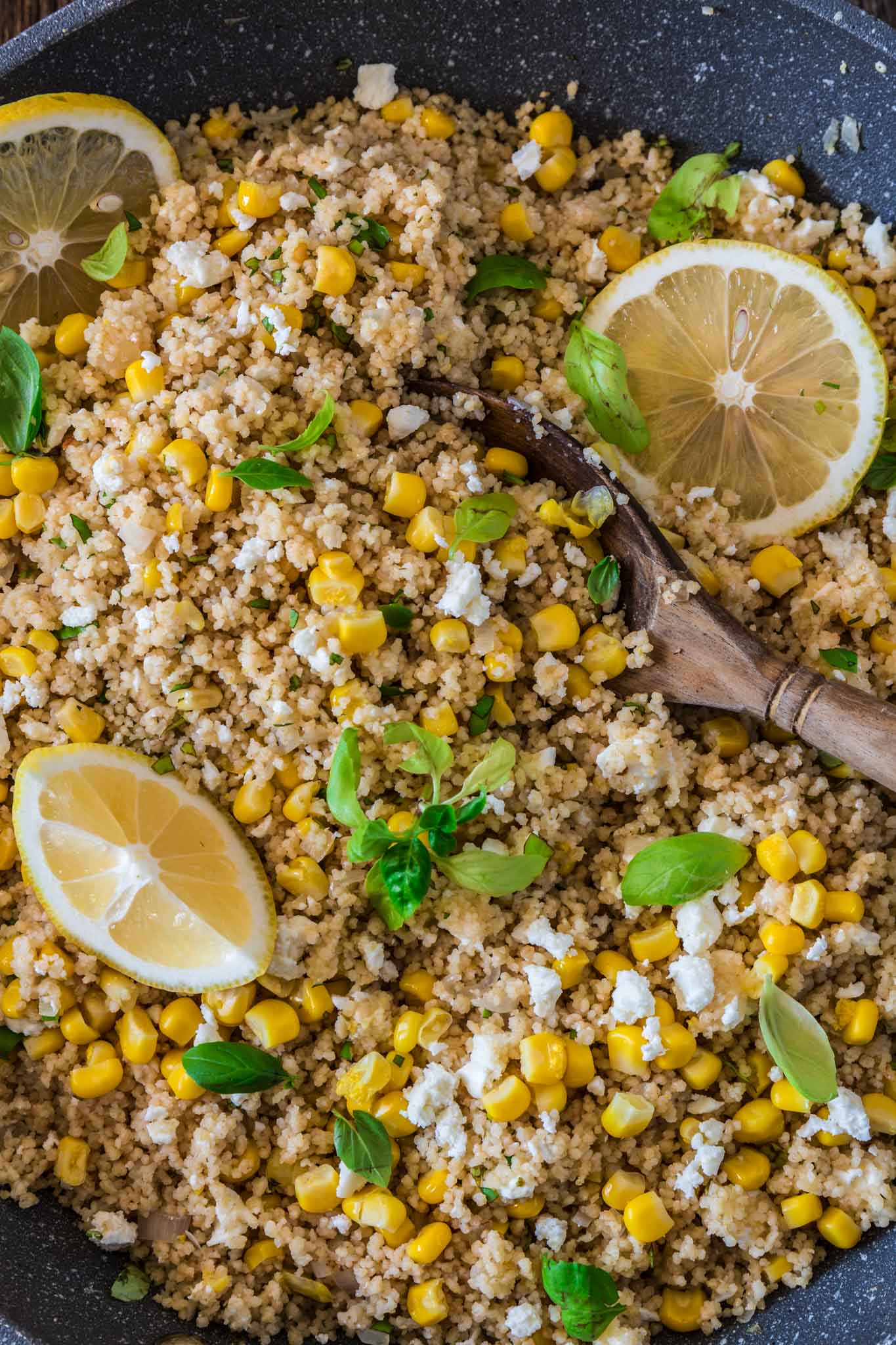 Corn Couscous with Basil, Feta and Lemon | www.oliviascuisine.com | This simple dish, packed with Mediterranean flavors, consists of only 7 main ingredients and is done in about 5 minutes. Serve it warm as a side dish, or cold as a salad. (Recipe and food photography by @oliviascuisine.)