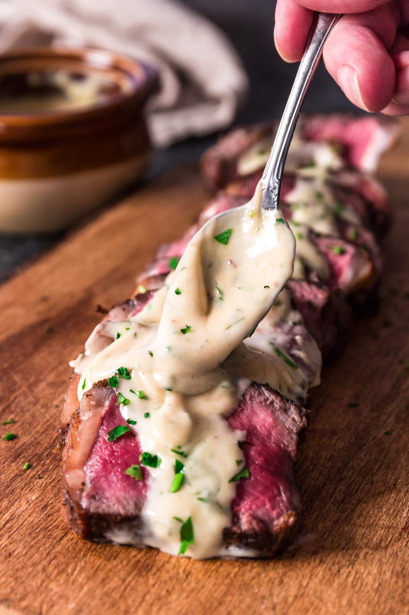 Pan Seared New York Strip Steak with Gorgonzola Sauce | www.oliviascuisine.com | No need to go to a steakhouse to enjoy a juicy New York Strip Steak, cooked to perfection. Follow my tips and you can make a superb steak dinner right at home, on your stove, in less than 30 minutes! The buttery Gorgonzola Cream Sauce is optional, but you'd be crazy to skip it. (Recipe and food photography by @oliviascuisine.)