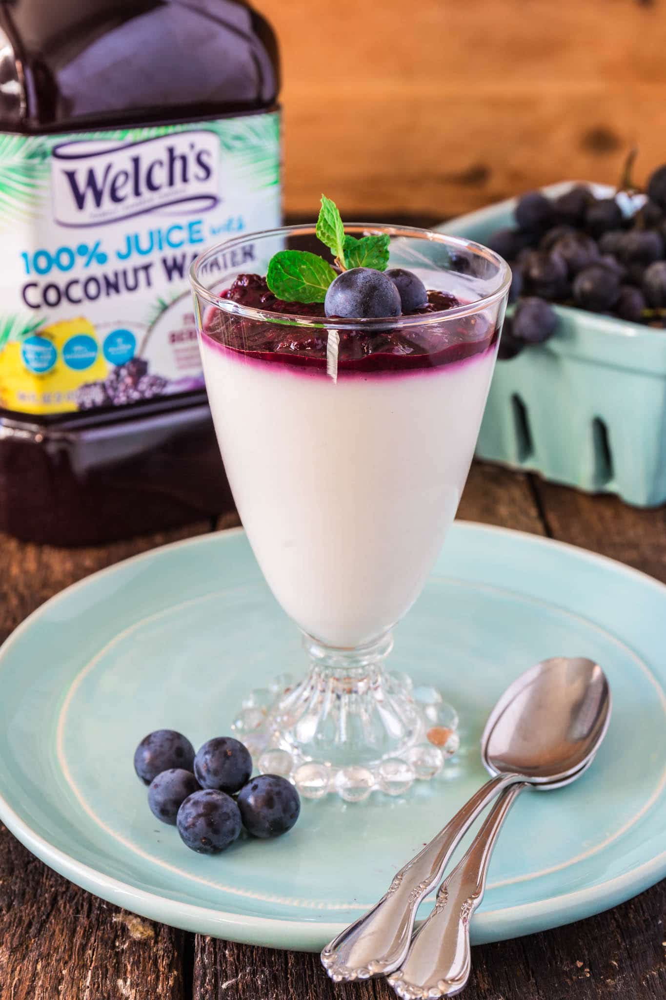 Yogurt Panna Cotta with Grape and Berry Compote | www.oliviascuisine.com | This lighter version of the classic panna cotta is made with greek yogurt instead of cream, so it won't ruin your diet! (Recipe and food photography by @oliviascuisine.)