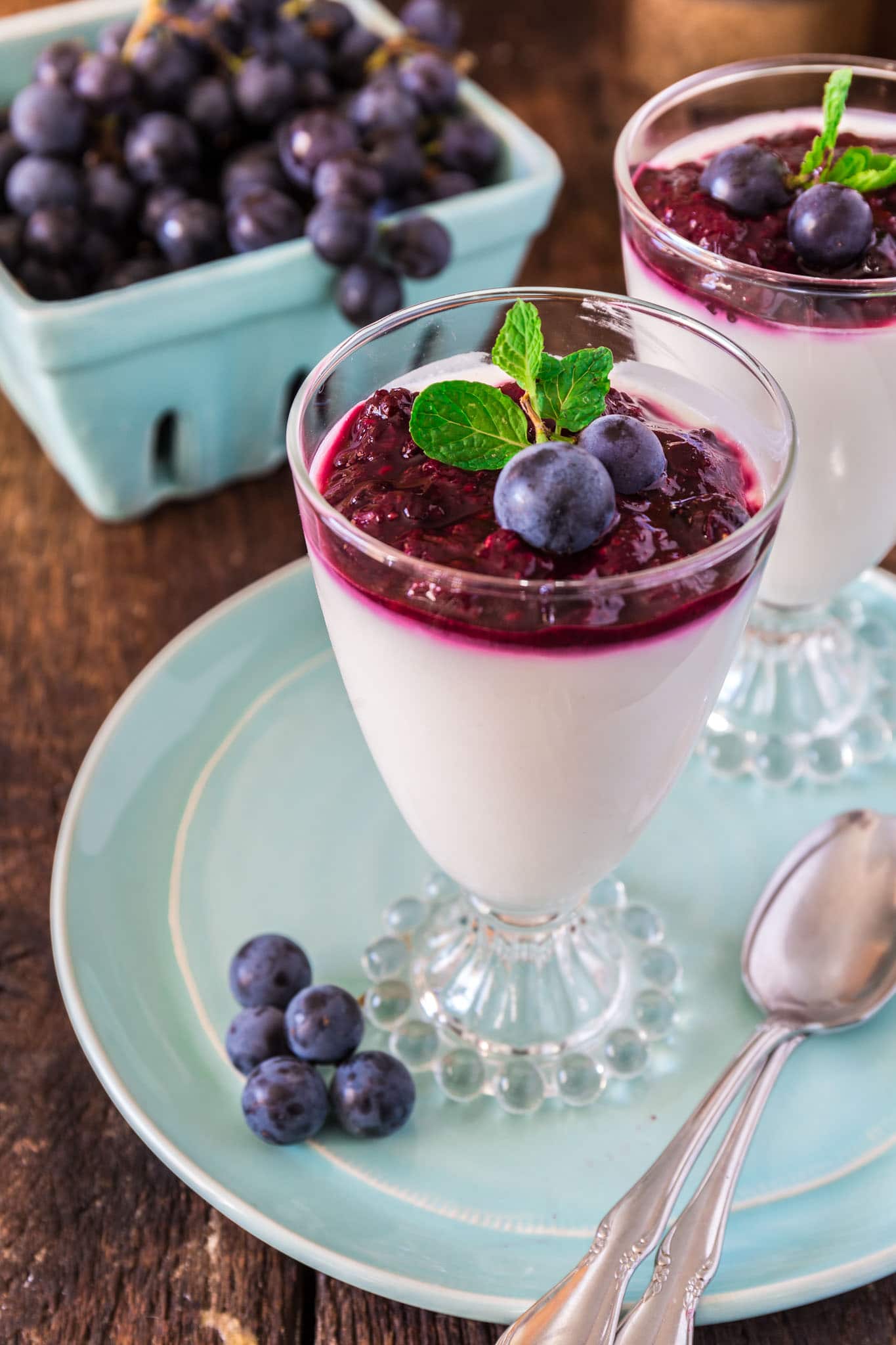 Yogurt Panna Cotta with Grape and Berry Compote | www.oliviascuisine.com | This lighter version of the classic panna cotta is made with greek yogurt instead of cream, so it won't ruin your diet! (Recipe and food photography by @oliviascuisine.)