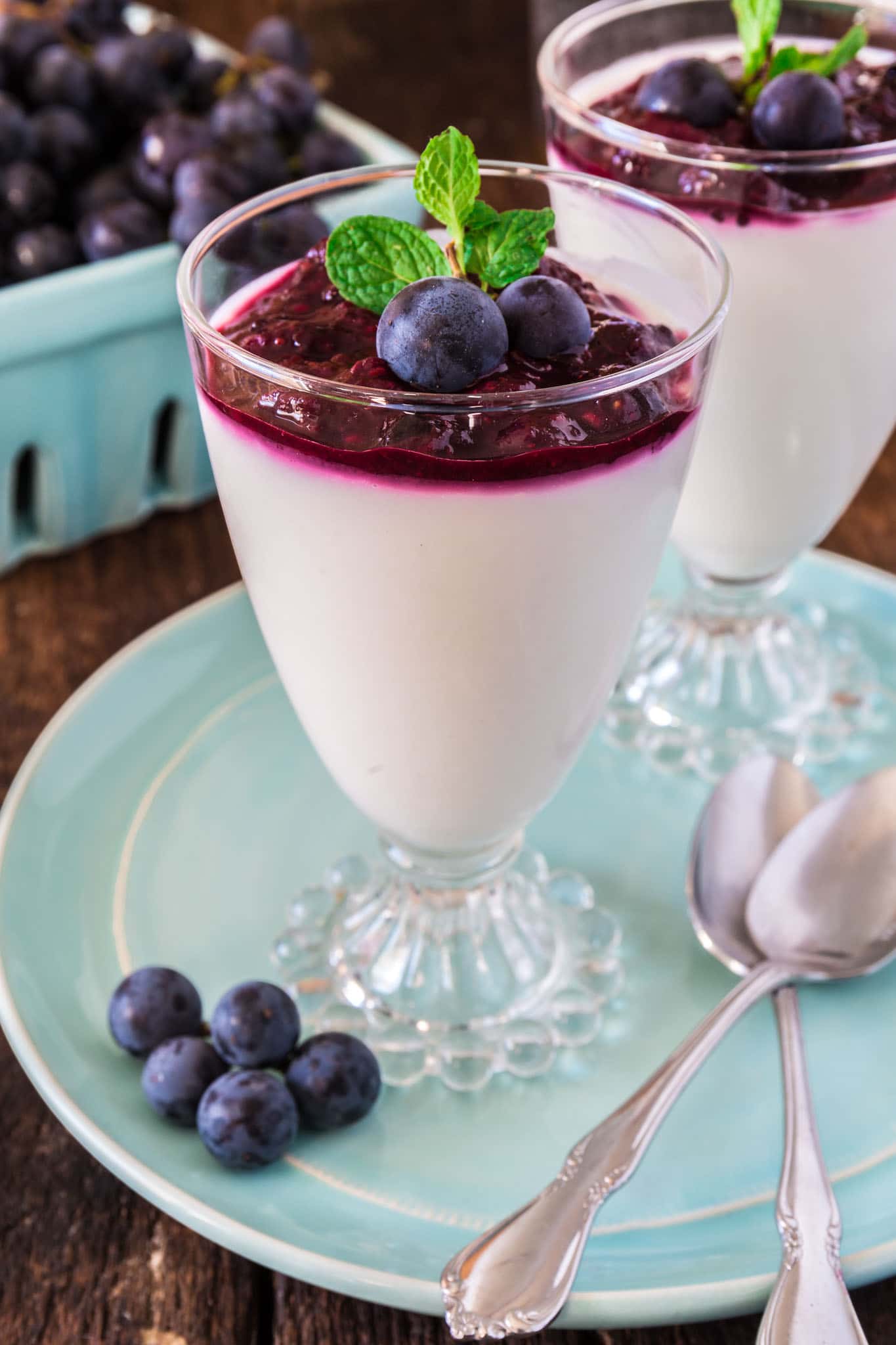 Yogurt Panna Cotta with Grape and Berry Compote | www.oliviascuisine.com | This lighter version of the classic panna cotta is made with greek yogurt instead of cream, so it won't ruin your diet! (Recipe and food photography by @oliviascuisine.)