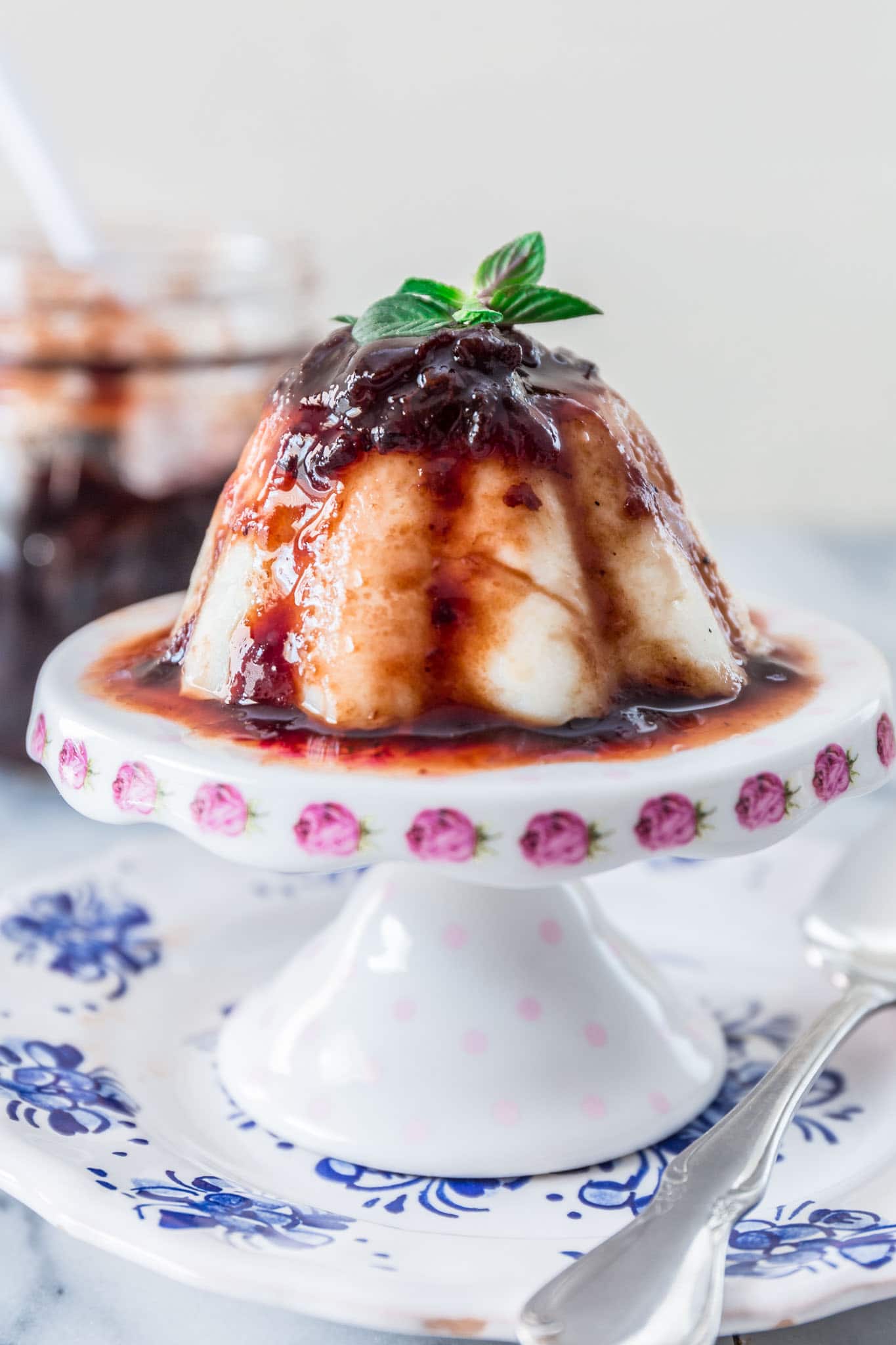 Brazilian Coconut Flan with Plum Sauce (Manjar Branco) | www.oliviascuisine.com | A classic Brazilian dessert, very popular during the holidays but easy enough to be enjoyed all year round! All you'll need are a handful of ingredients and a little bit of patience to wait for the flan to set in the fridge overnight. (Recipe and food photography by @oliviascuisine.)