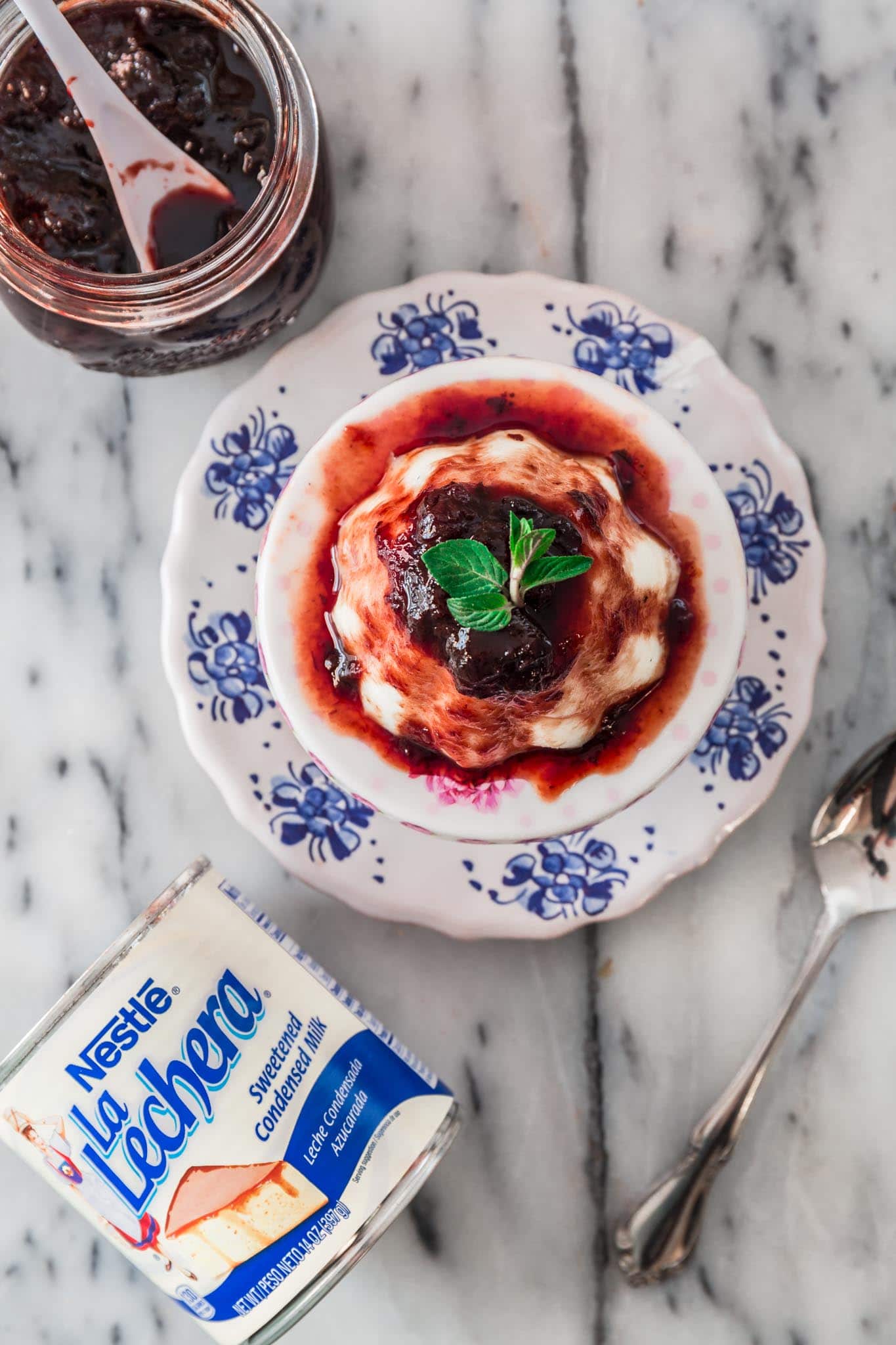 Brazilian Coconut Flan with Plum Sauce (Manjar Branco) | www.oliviascuisine.com | A classic Brazilian dessert, very popular during the holidays but easy enough to be enjoyed all year round! All you'll need are a handful of ingredients and a little bit of patience to wait for the flan to set in the fridge overnight. (Recipe and food photography by @oliviascuisine.)