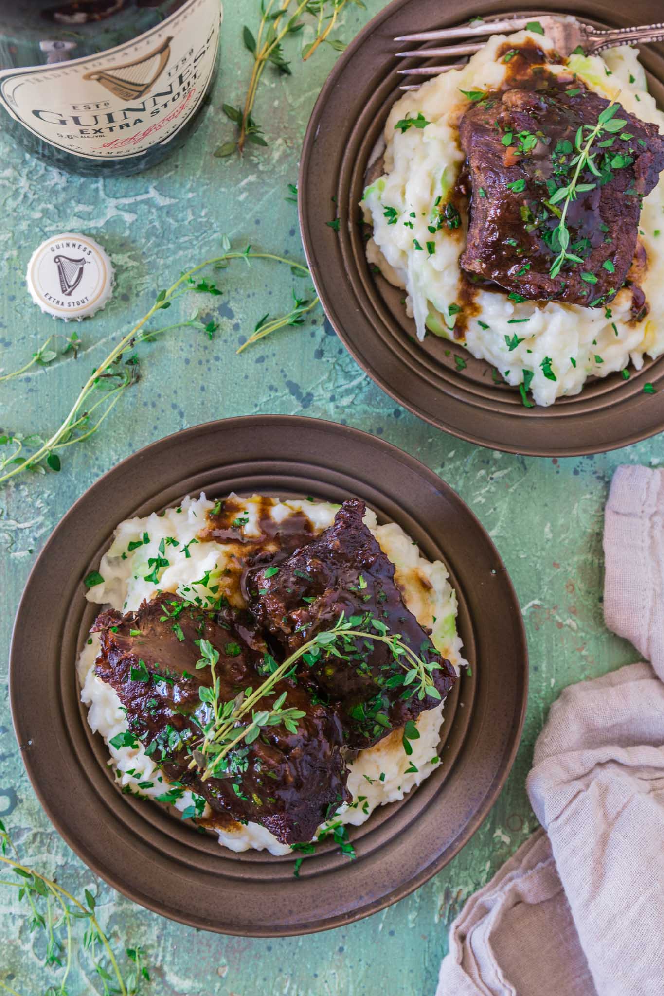 Stout Beer Braised Short Ribs | www.oliviascuisine.com | Celebrate St. Patrick's Day by cooking these Irish inspired Stout Beer Braised Short Ribs. Rich, hearty and incredibly fall-apart tender! Serve it over colcannon or with some Irish soda bread to soak up all that luscious beer gravy goodness. (Recipe and food photography by @oliviascuisine.)