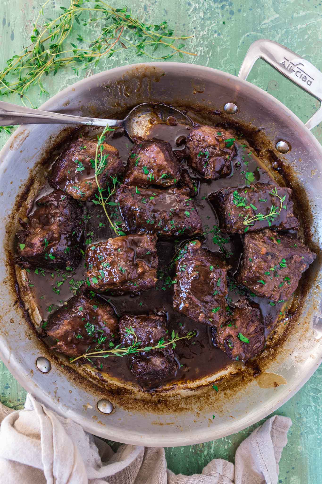 Stout Beer Braised Short Ribs | www.oliviascuisine.com | Celebrate St. Patrick's Day by cooking these Irish inspired Stout Beer Braised Short Ribs. Rich, hearty and incredibly fall-apart tender! Serve it over colcannon or with some Irish soda bread to soak up all that luscious beer gravy goodness. (Recipe and food photography by @oliviascuisine.)