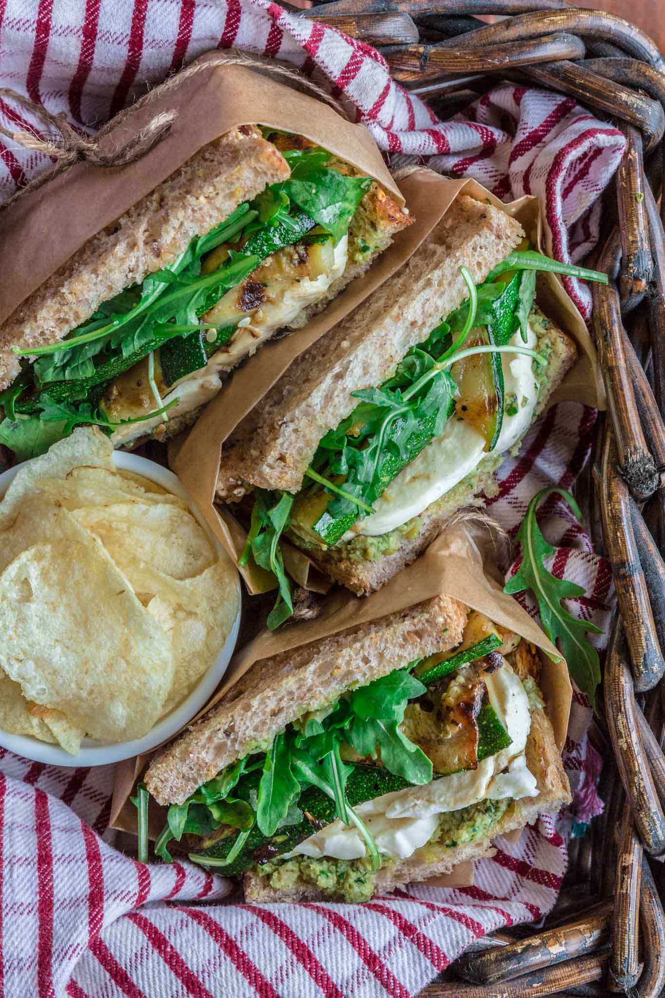 Grilled Zucchini Sandwich with Green Olive Pesto | www.oliviascuisine.com | This delicious Grilled Zucchini Sandwich will get you excited about picnic weather. Packed with a lot of flavor, thanks to a homemade green olive pesto, fresh mozzarella, arugula and, the star of the show, grilled zucchini. Lip smacking good and guilt-free? What more could you possibly ask for? (Recipe and food photography by @oliviascuisine)