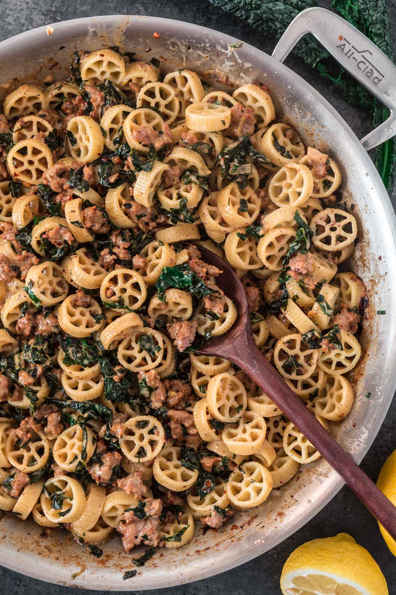 Creamy Sausage Kale Pasta | www.oliviascuisine.com | Possibly my favorite pasta dish, this Creamy Sausage Kale Pasta combines Italian sausage with rich and earthy Tuscan Kale. Tossed in the creamiest lemon parmesan sauce! And you can make it as mild or as spicy as you like! (Recipe and food photography by @oliviascuisine.)