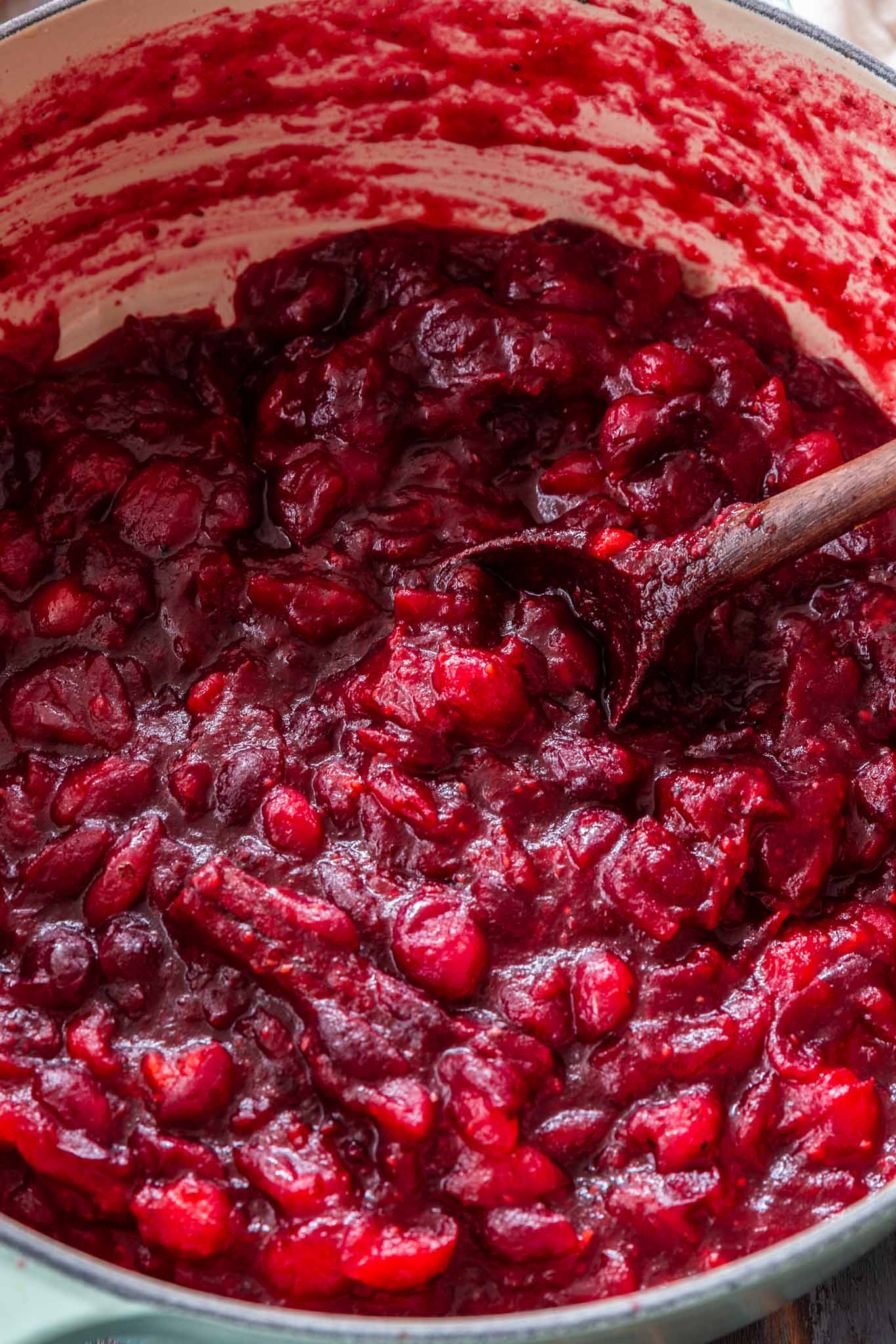 Honey Bourbon Cranberry Sauce | www.oliviascuisine.com | This Honey Bourbon Cranberry Sauce might steal the show this Thanksgiving! Sweet, tart, chunky and so easy to make. You will never buy the canned stuff again! (Recipe and food photography by @oliviascuisine.)