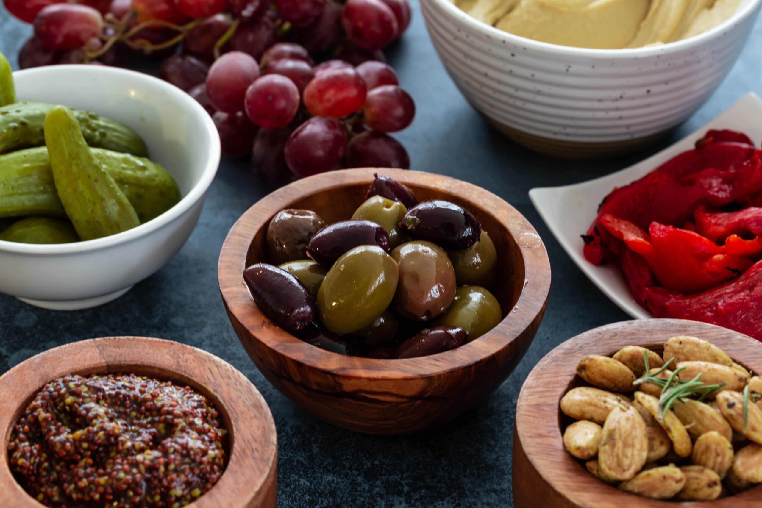 How to Make a Charcuterie Board | www.oliviascuisine.com | Every party deserves a classy and elegant charcuterie board! Carefully curated meats, cheeses and spreads are a great way to feed a crowd. Add some Blue Diamond® Gourmet Almonds and Blue Diamond® Almond Nut-Thins® and you're all set for success! (Recipe and food photography by @oliviascuisine.)