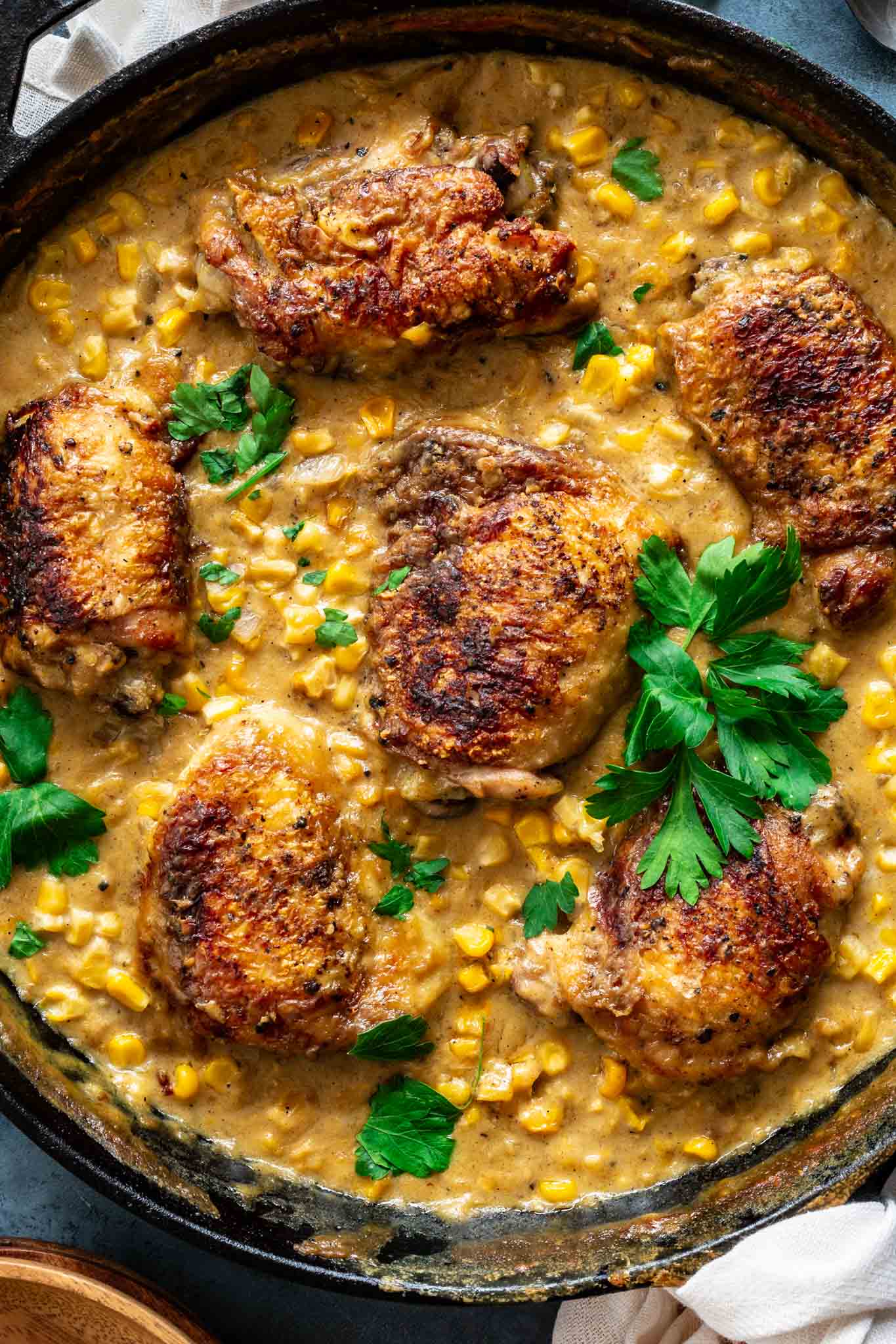 A close shot of chicken and creamed corn