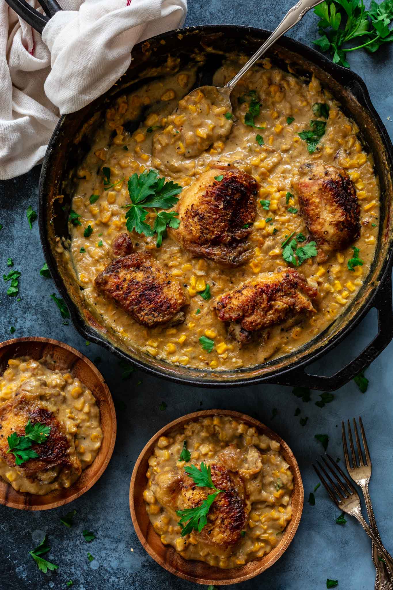 Chicken Thighs and Creamed Corn being served